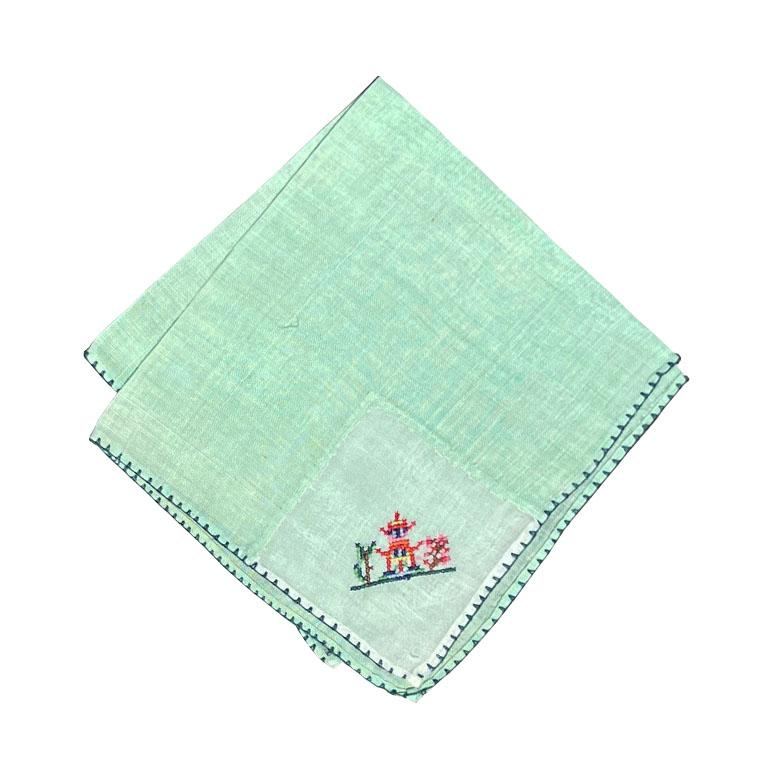 A set of five chinoiserie mint green hand-stitched and embroidered table napkins. This set of mid-century table linens will be a fabulous addition to your next dinner or cocktail party. Each napkin is square and in a bright mint green fabric. The