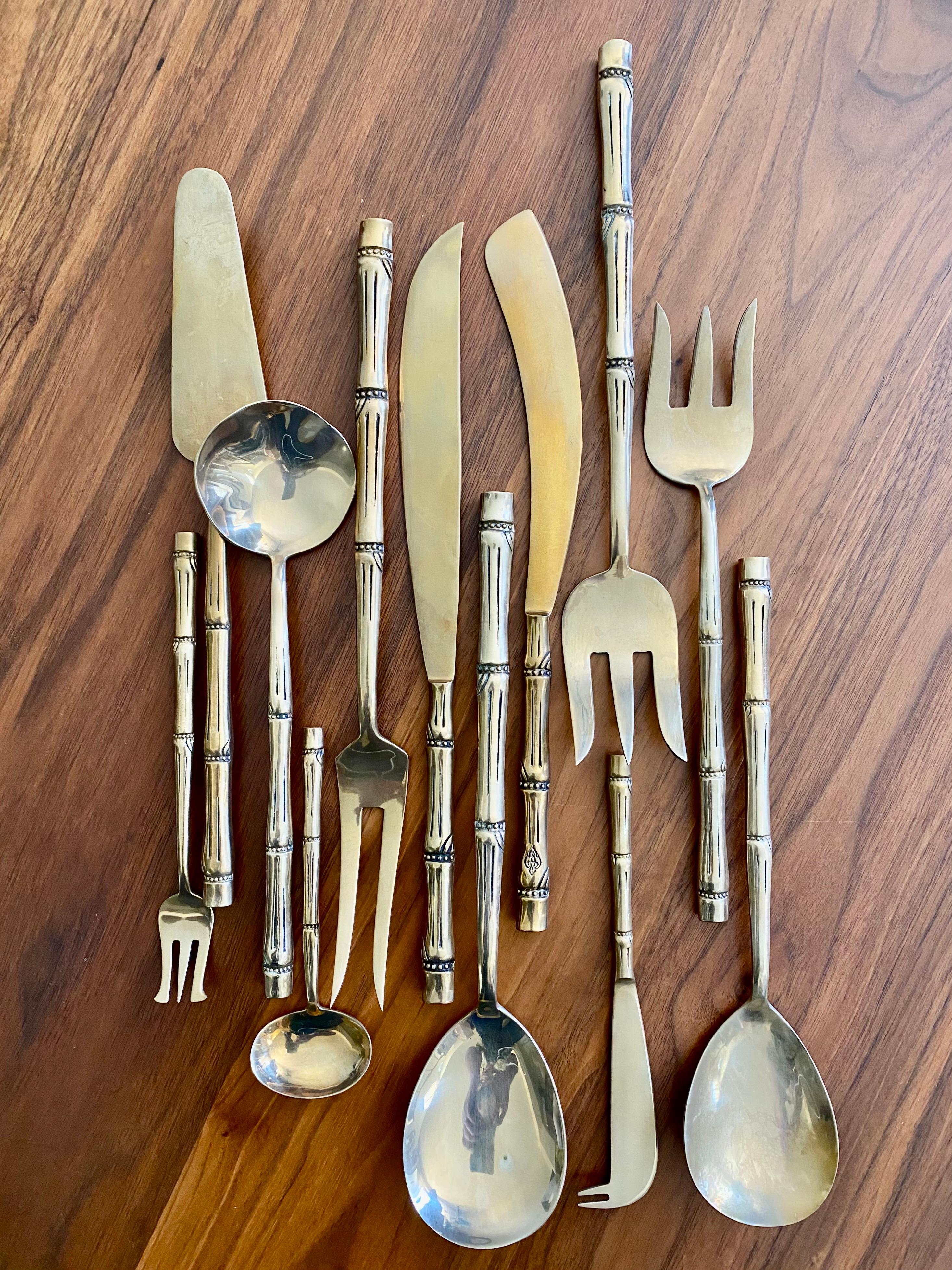 Beautiful, Chinoiserie-Style faux bamboo nickel bronze flatware in very nice original hardwood storage box. This set is in excellent condition and is composed of the following (One Hundred and Forty Four) pieces:

Twelve Dinner Knives
Twelve Steak