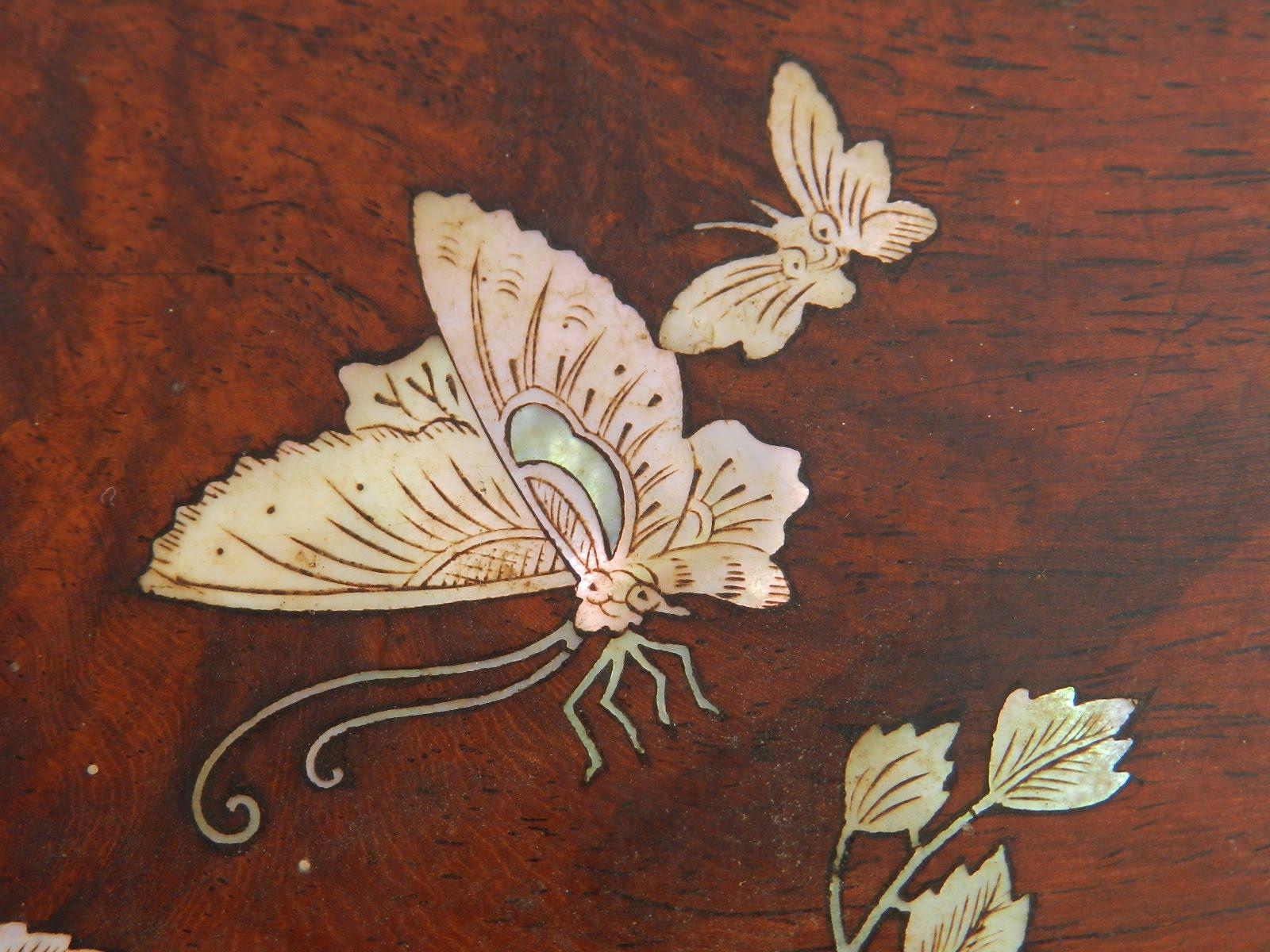 Oval Hardwood Tray Inlaid with M o Pearl Chinese late 19th Century
Chinoiserie incrusted Butterflies and Flowers
Please see Chinoiserie Center Piece Oval Inlaid Red Bowl late 19th Century that is listed separately
Some small losses to the mop not