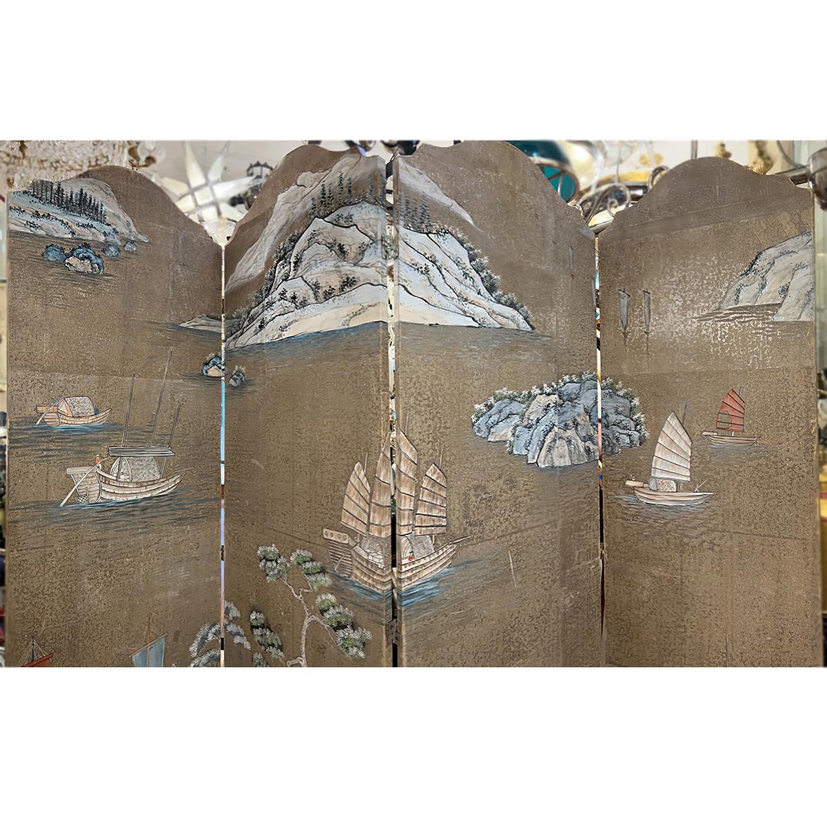 A 1940s chinoiserie decorated screen with landscape motif on a silver and gold background.
Measurements:
Height: 84