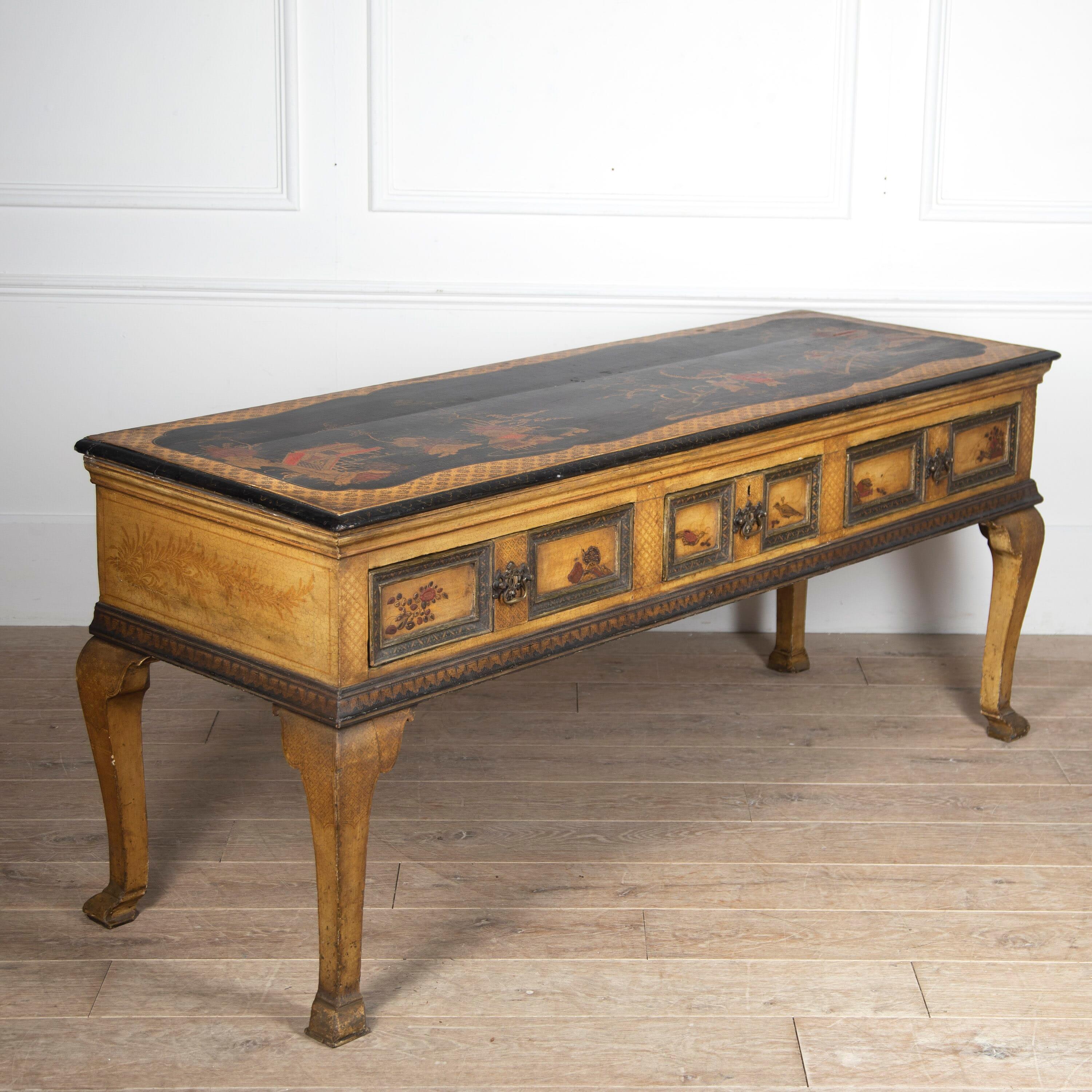Superb 18th century pine serving table. 

This pine table features a superb 19th century Chinoiserie decoration throughout. To the top of this table, there is a variety of cartouche decorations with gilded, black chinoiseries scenes also. 

The