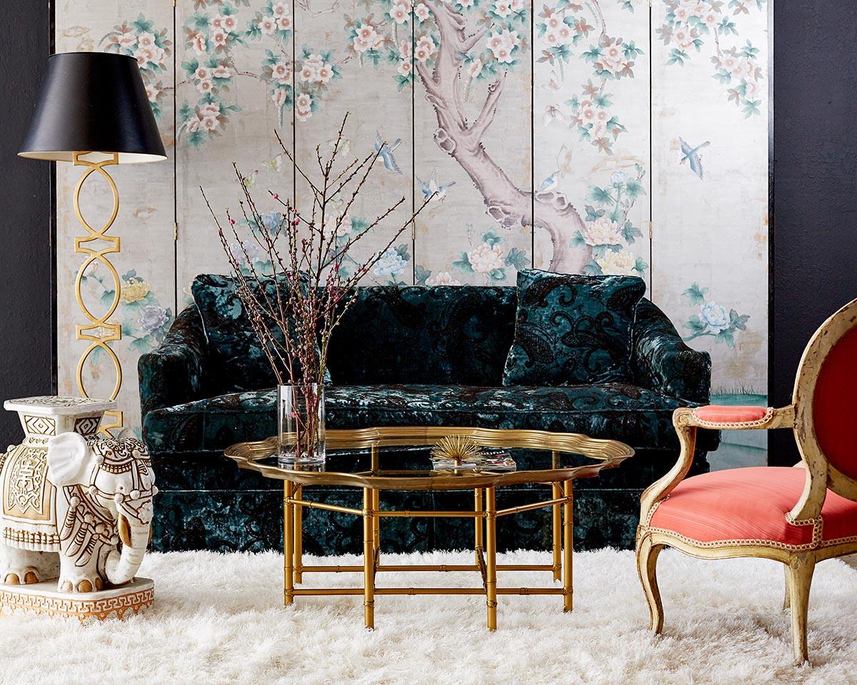Elegant and feminine chinoiserie six-panel wallpaper screen featuring a hand painted scene of flowers, birds, and butterflies over a hand-applied silver leaf background. Crafted from wood panels covered in a green textured wallpaper then carefully