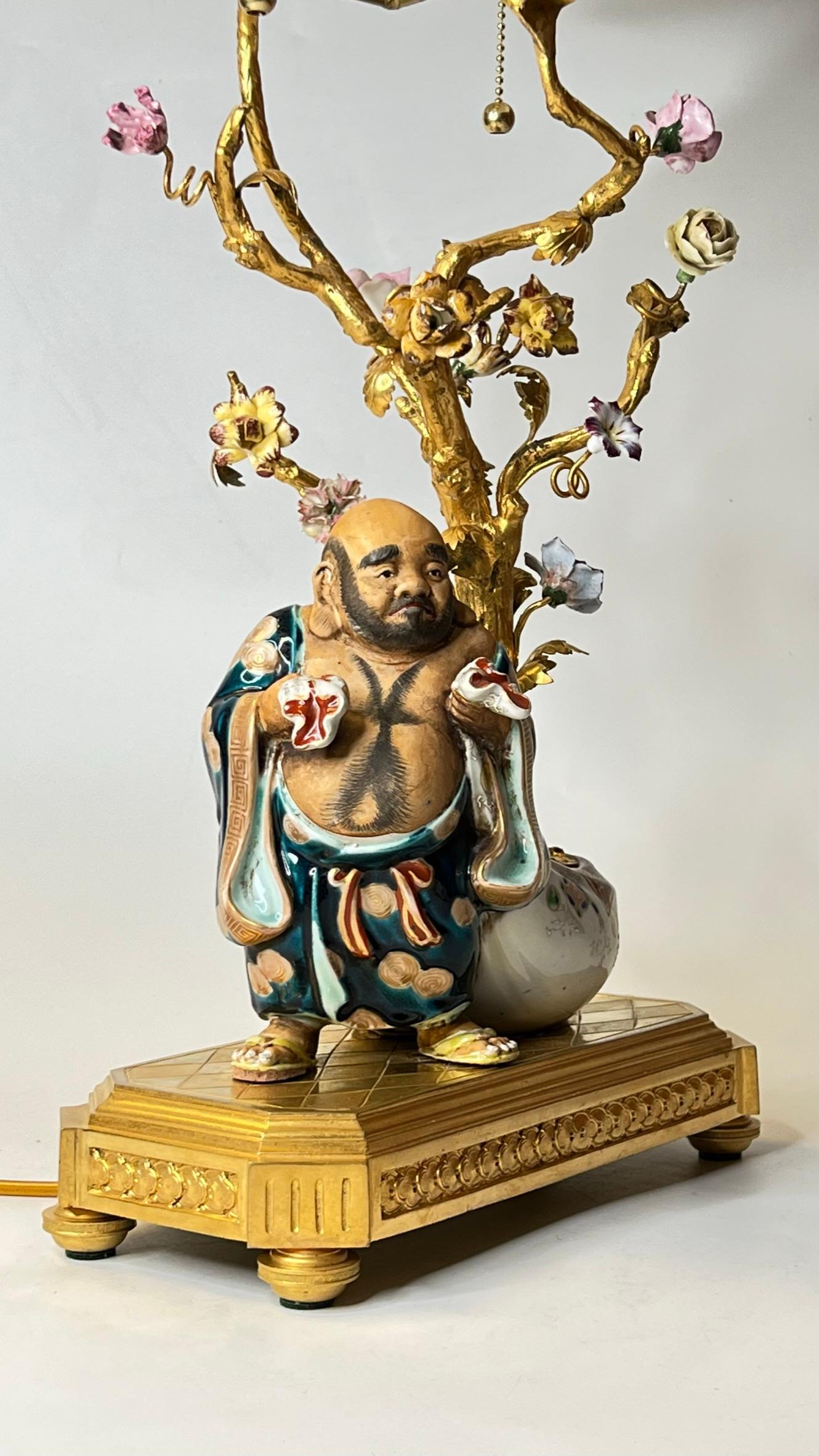 Chinoiserie Porcelain and Gilt Bronze Table Lamp Depicting Budai Laughing Buddha In Good Condition In New York, NY