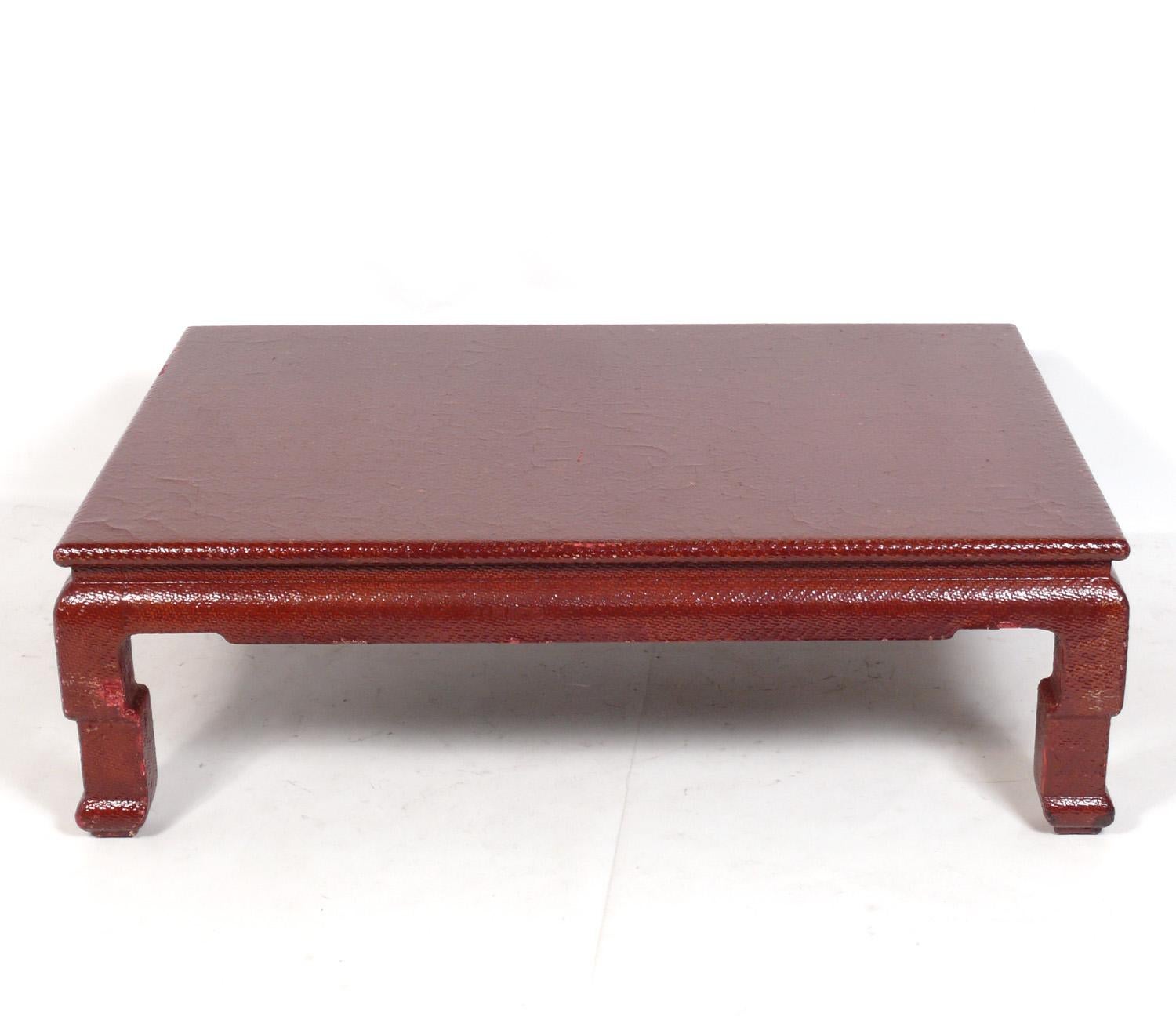 Chinoiserie Raffia Wrapped Coffee Table, in the style of Karl Springer, unsigned, American, circa 1960s. This table is currently being refinished and can be completed in your choice of color, including the original Chinese Red color, or any paint