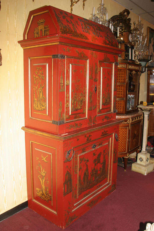 A very fine bookcase with unusual chinoiserie style decoration and code of arm. Applied wrought iron mounts.
Stock number: F43.