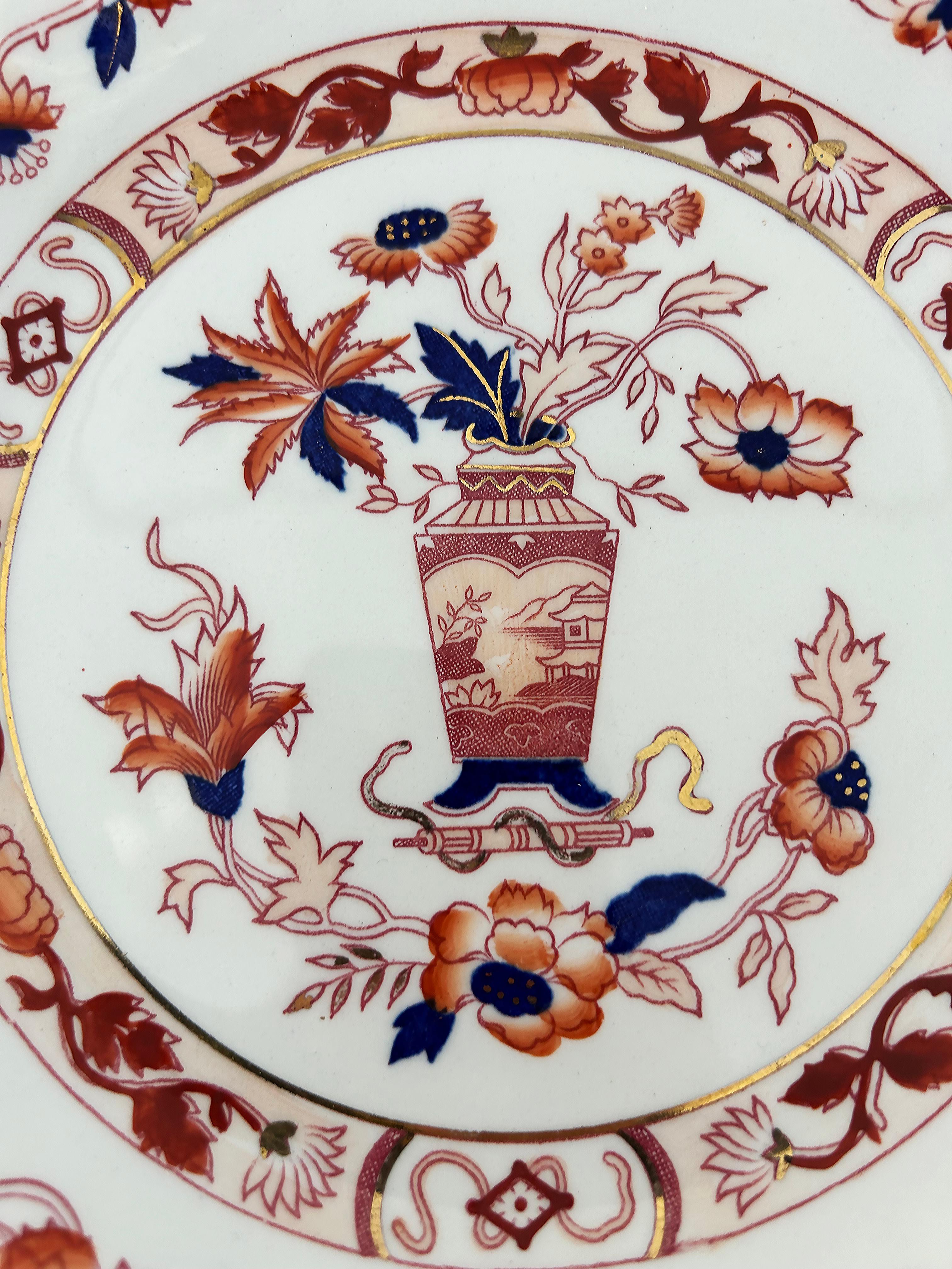 Chinoiserie Red, Blue and Gilt Decorated Porcelain Plate, Illegibly Marked

Offered for sale is a Chinoiserie style porcelain decorative red, blue, and gilt decorated porcelain plate. This plate is great to serve on or to hang on a wall.