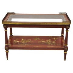 Mesa de centro oriental con tapa de cristal y laca roja y pintura dorada Chinoiserie