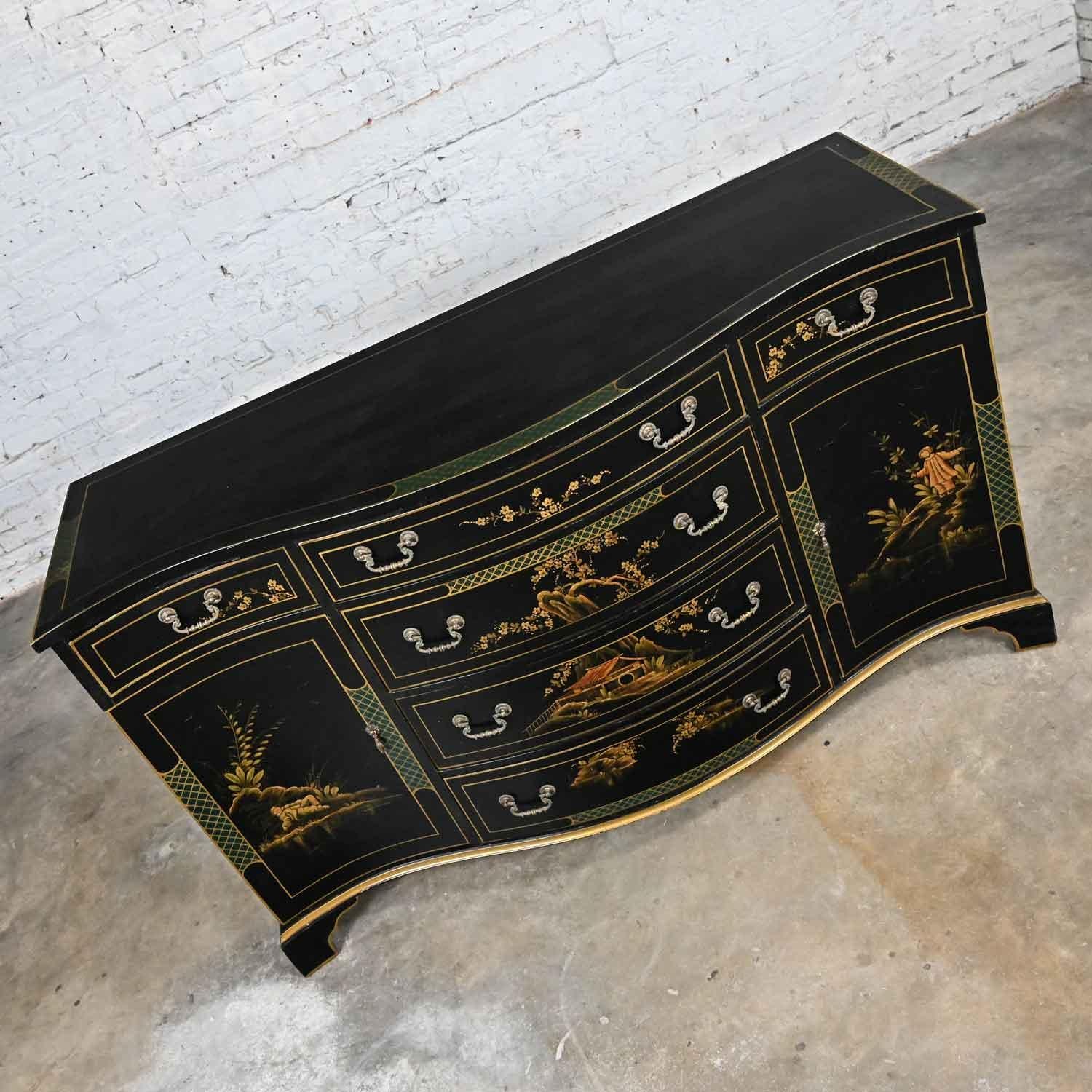 Magnificent vintage Regency style Union National Inc patinated black painted & gilt buffet or sideboard. Beautiful condition, keeping in mind that this is vintage and not new so will have signs of use and wear. This piece has a new coat of poly on