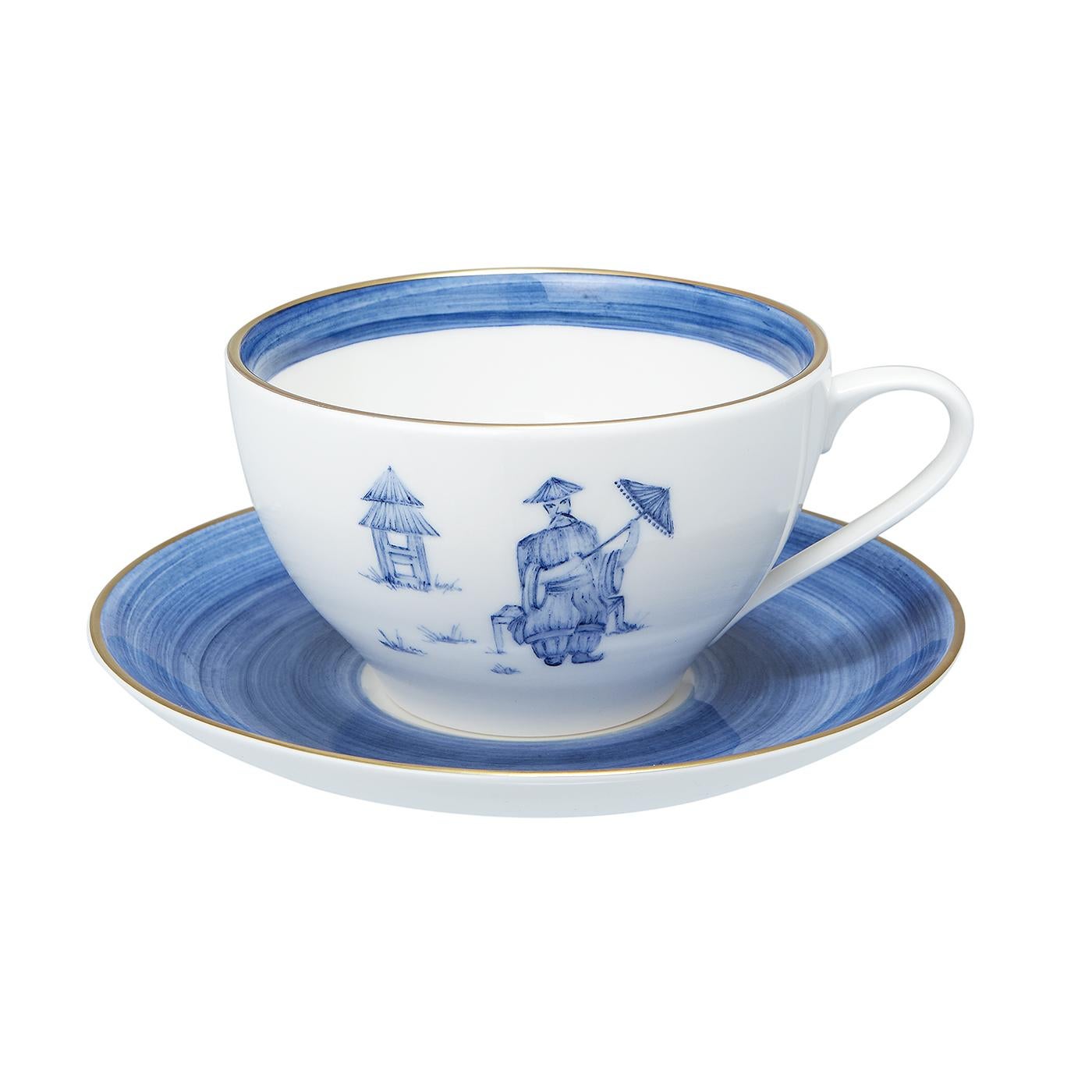 These completely handmade porcelain cups with saucers are painted by hand with a charming hands-free chinoiserie decor. The set comes as a set of four hand painted cups with a chinoiserie decor in four different colors. Rimmed by hand with a fine