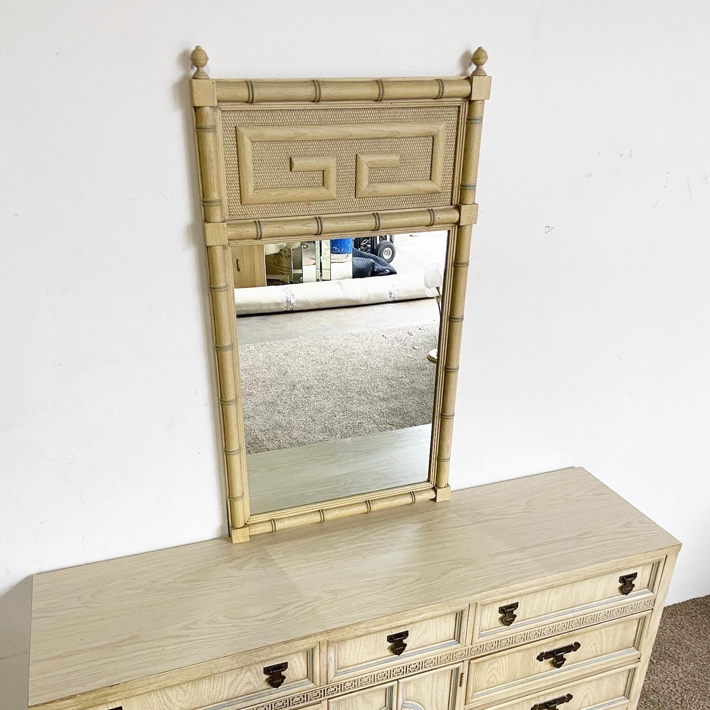 Experience Eastern elegance with our Chinoiserie Shangri-La Dresser With Mirror by Dixie, combining intricate detailing, brass accents, and practicality.

Crafted with intricate detailing, a hallmark of Chinoiserie design.
Enhanced by brass accents