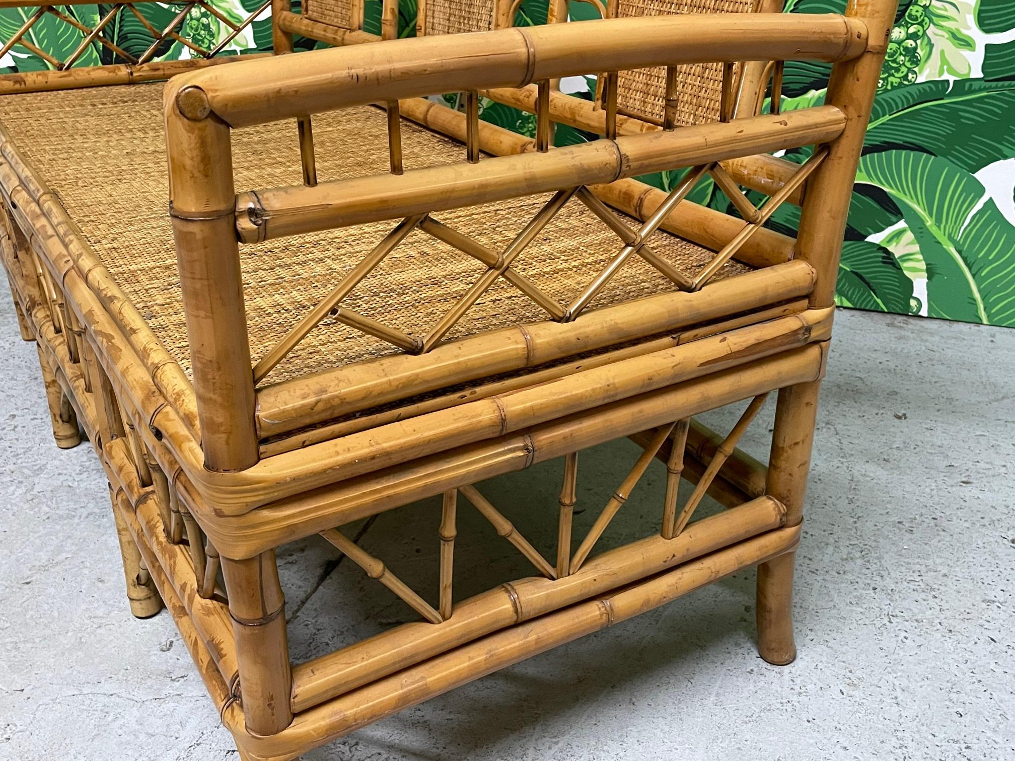 Vintage bamboo bench features an Asian chinoiserie design and woven wicker seat and back inserts. Very good condition with only minor imperfections consistent with age.