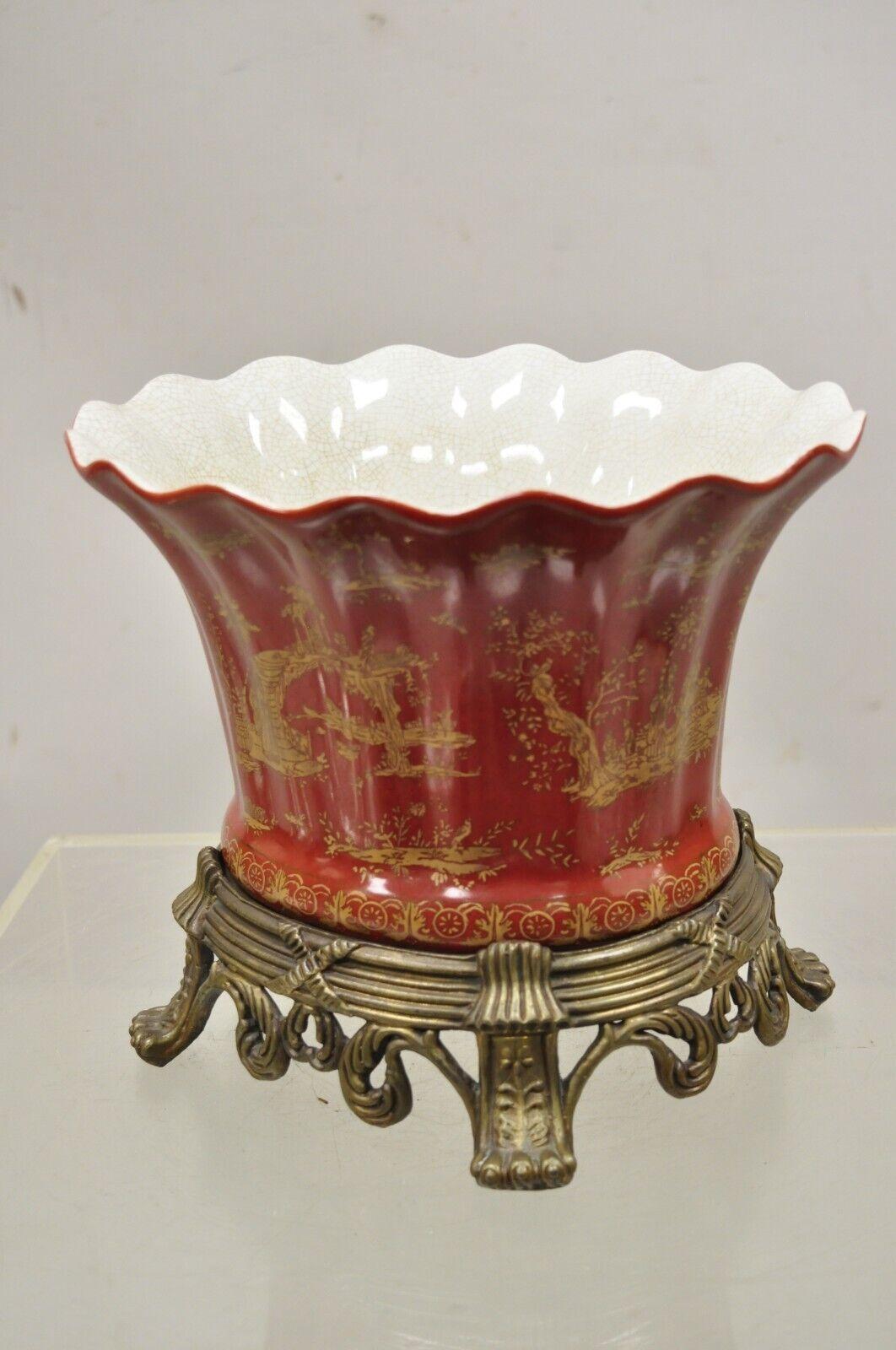 Chinoiserie style red ceramic scalloped planter pot on ornate bronze base. Item features figural chinoiserie design, ornate bronze base, very nice item, great style and form, circa Late 20th - Early 21st. Measurements: 9