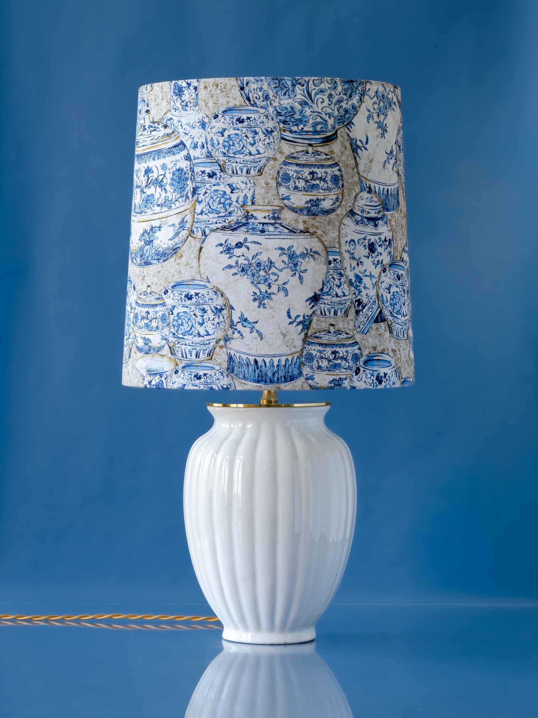 Meet Vasen (which means vases in Dutch, part of the meta vibe of this lamp)—she’s part Amitābha Studio's fresh blue and white series of one-of-a-kind table lamps. Flipping things on their head, we’ve paired vintage Delft White vases with custom made