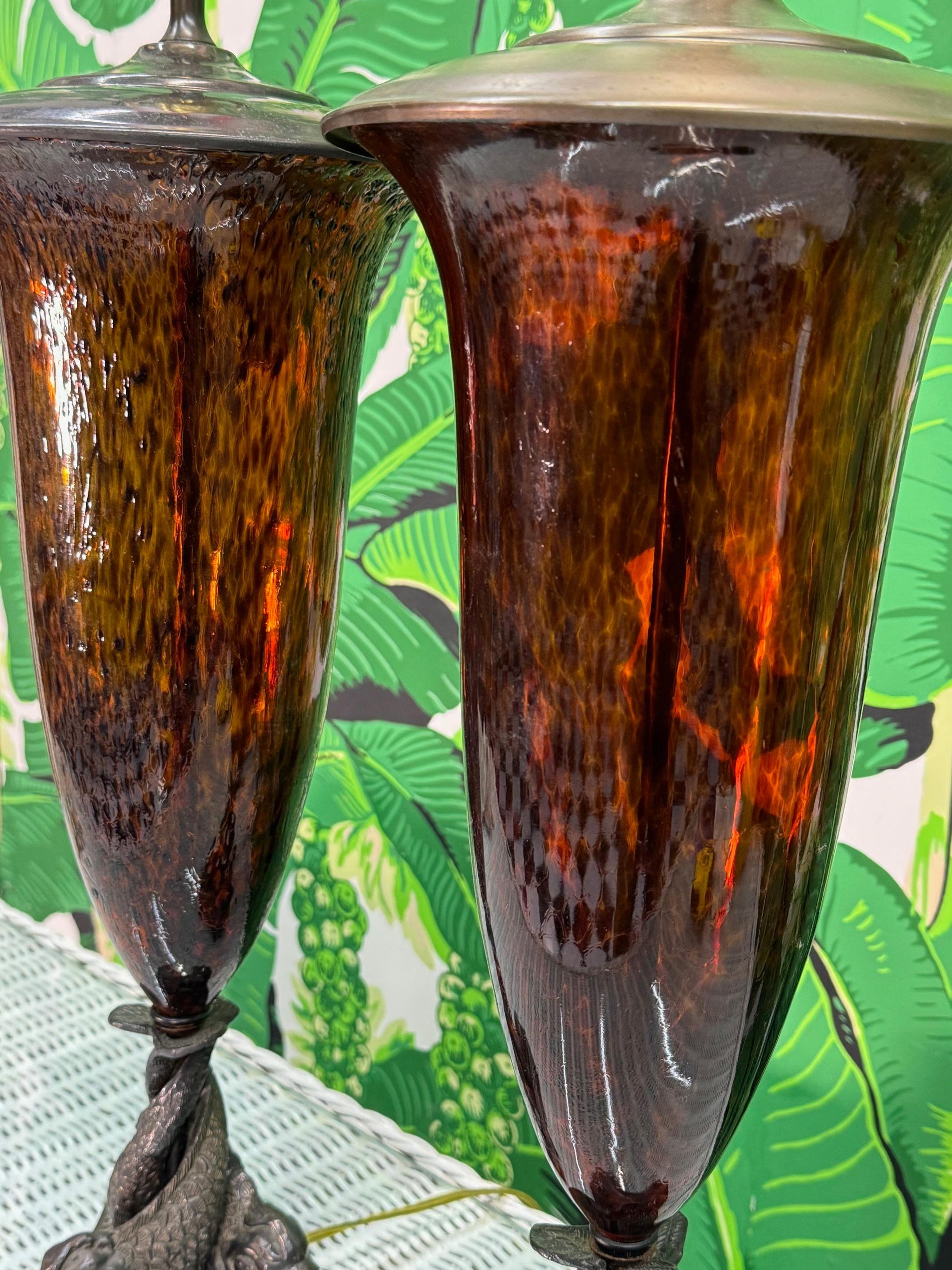 Pair of vintage table lamps feature a tortoise shell glass body and bronze japanese koi fish detailing. Good condition with minor imperfections consistent with age, see photos for condition details.
For a shipping quote to your exact zip code,