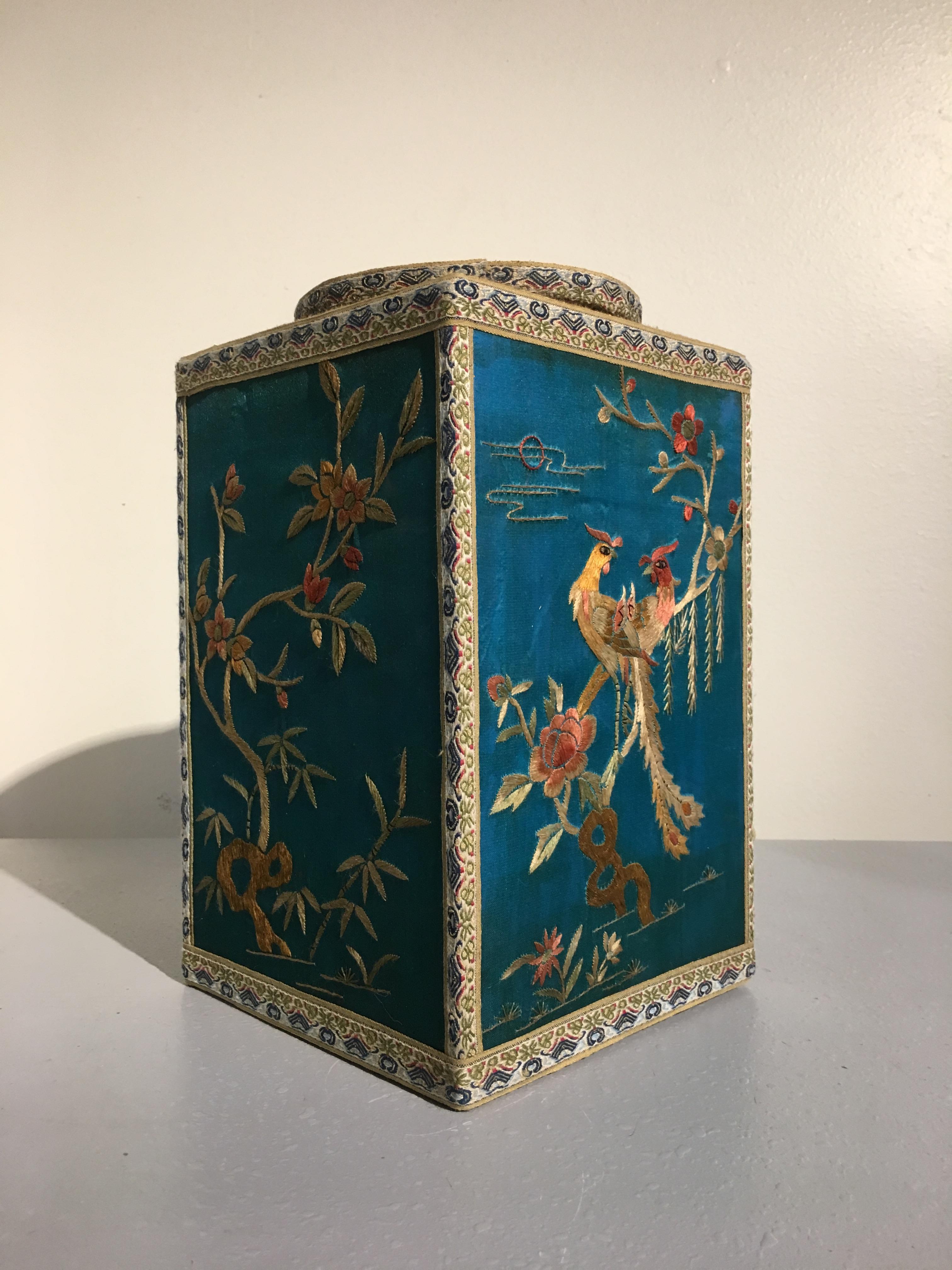 A beautiful Chinese embroidered silk tea caddy, in the chinoiserie taste, 1920s China.

The large tea caddy covered in a vibrant turquoise silk and finely embroidered. The sides of the tea caddy colorfully embroidered with various flowers,
