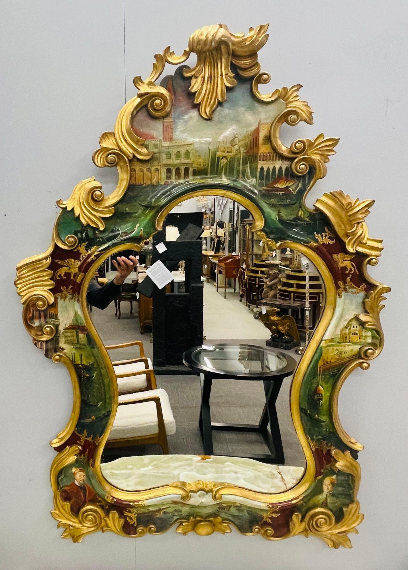 Chinoiserie wall, console or over the mantle mirror, italian, hand painted.
A Bombay framed wall mirror having all over Chinoiserie hand painted decorative scenes of figures, houses, winged lions and the like on a largely green and red background