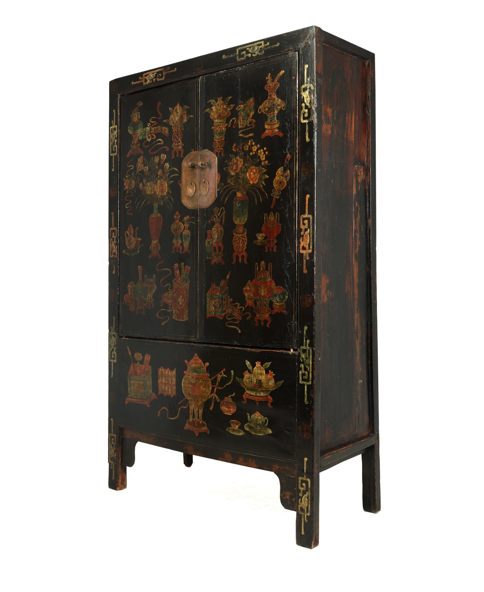 A Chinese solid elm cabinet with original lacquer produced in Northern China during the Quing Dynasty, this cabinet was usually bought as a gift for a newly married couple and lot were restored and exported to Europe from china in the 1980’s amongst