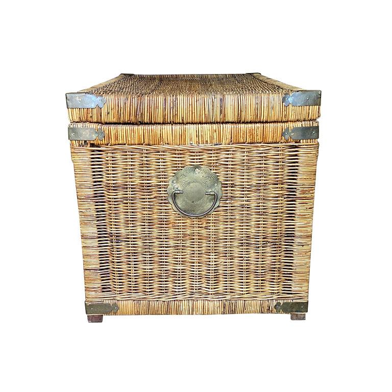 Adding extra storage in your home doesn't have to be fussy. This wicker blanket chest or trunk will be a great option to hold a number of items that clutter up space when not in use. The trunk is created from wood and wicker and features chinoiserie