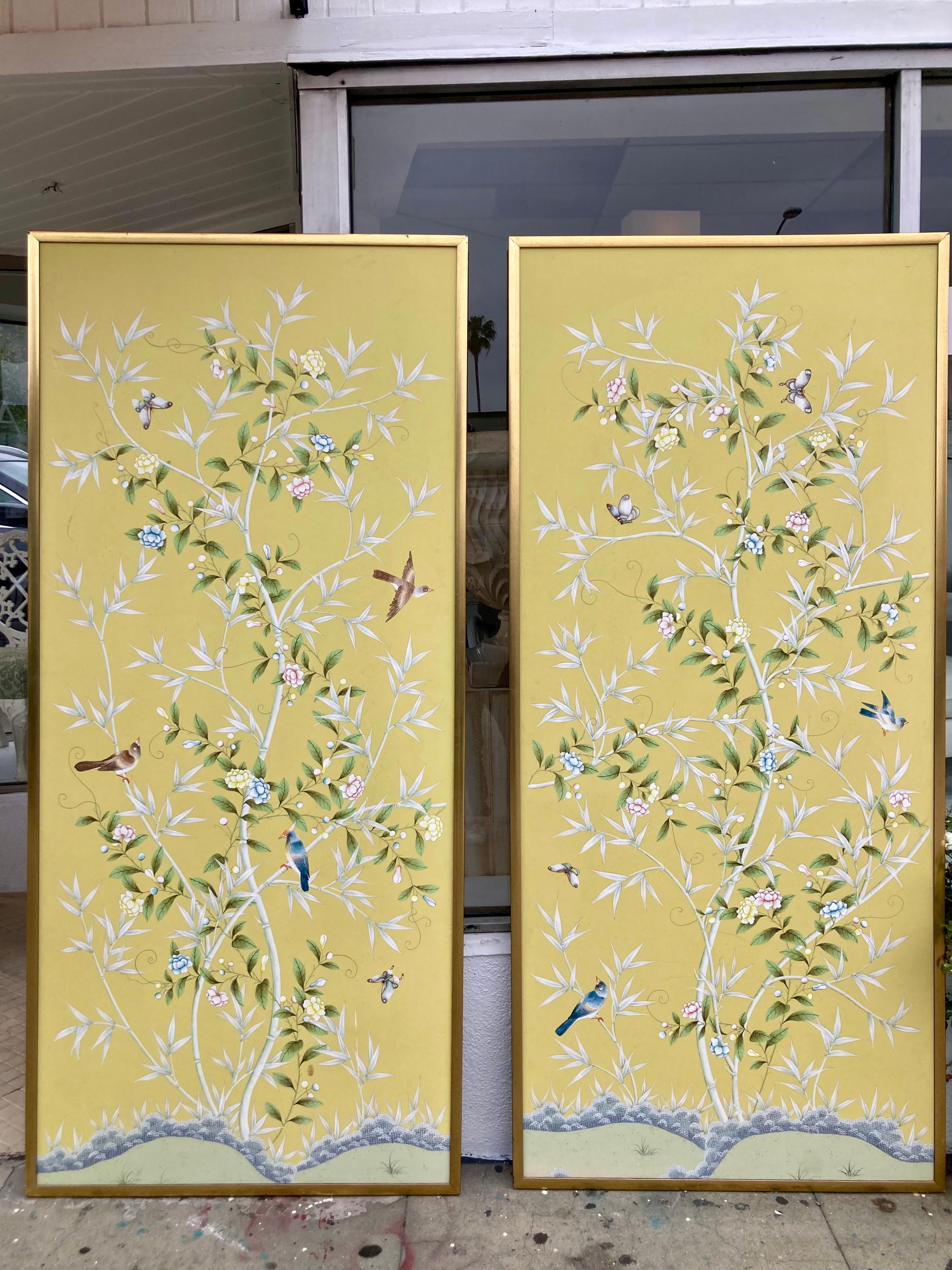 Beautiful pair of Chinoiserie yellow wallpaper panels framed nicely in a gilt gold finish. Nice pair of 20th Century Chinoiserie wallpaper panels with some wear and surface marks but consistent for the age and add to the character. Very unusual