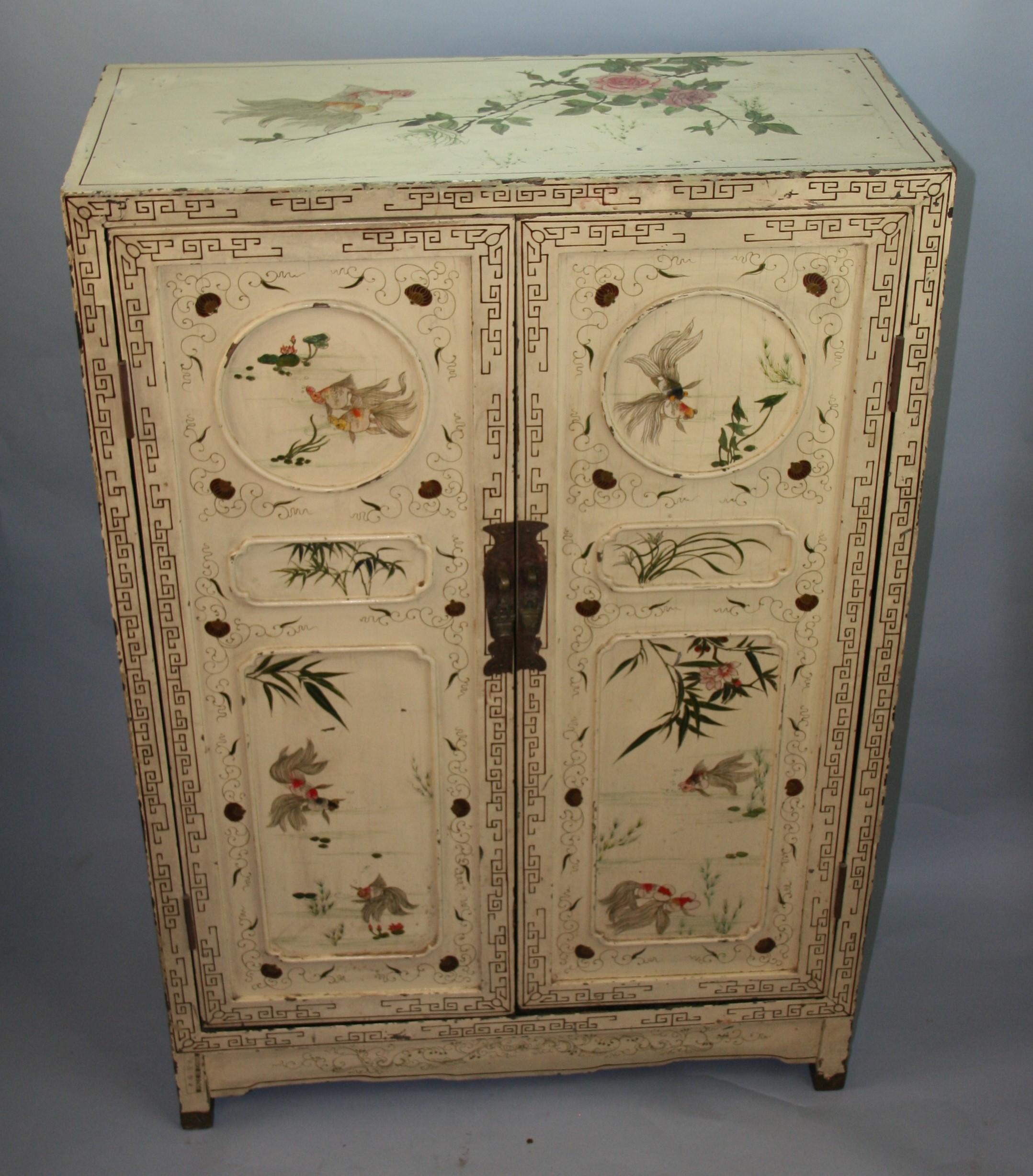 Beautiful hand painted cabinet with brass details.