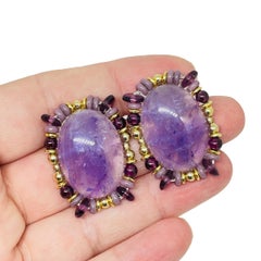 CHIPITA signed vintage gold tone purple amethyst gemstone designer clip earrings