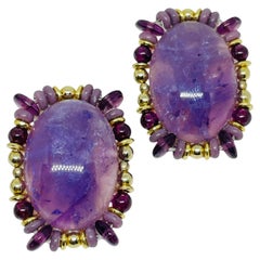 CHIPITA signed vintage gold tone purple amethyst gemstone designer clip earrings