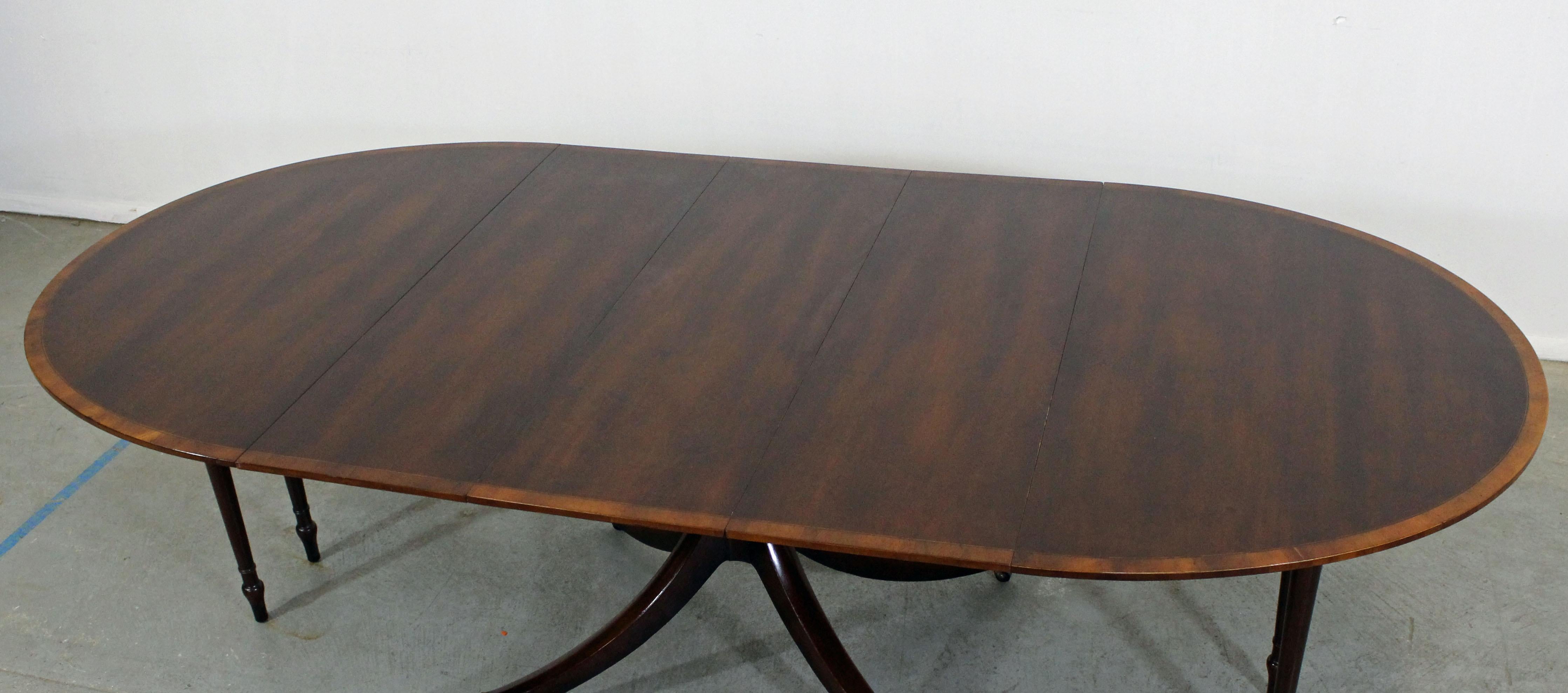 baker extendable dining table