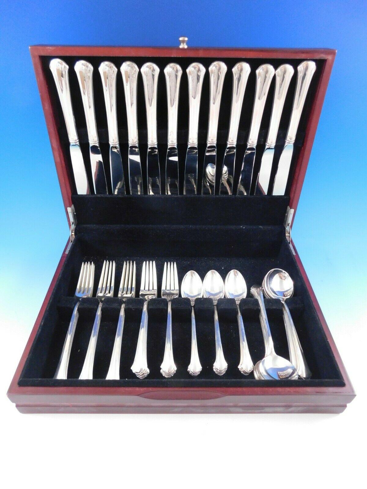 Dinner size Chippendale by Towle sterling silver flatware set - 60 pieces. This set includes:

12 dinner size knives, 9 5/8