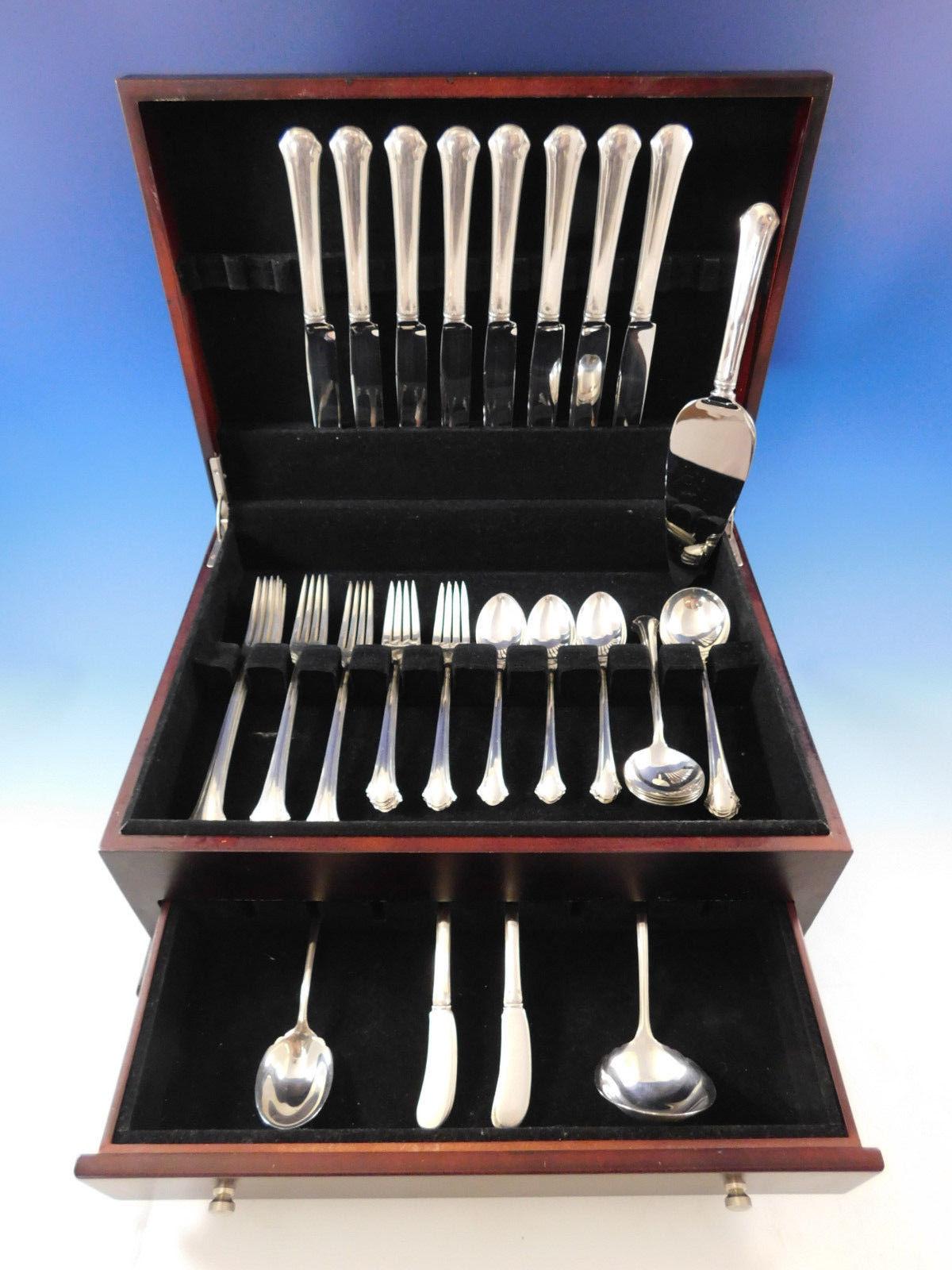 Dinner size Chippendale by Towle sterling silver flatware set - 51 pieces. This set includes:

Eight dinner size knives, 9 5/8