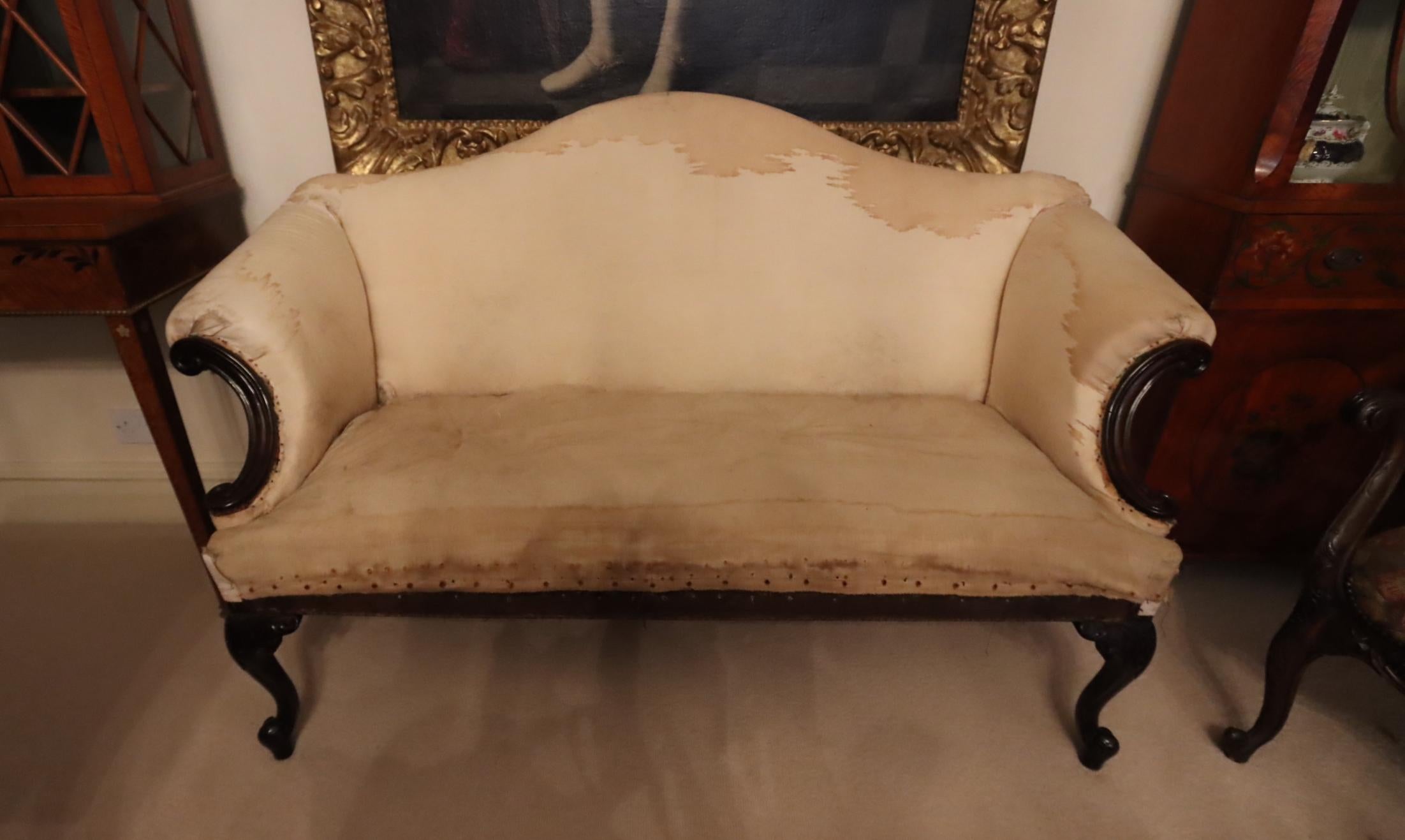 Behold this extraordinary Chippendale Camelback Sofa, a true masterpiece of timeless elegance! Adorned with breathtaking claw and ball feet, this opulent sofa hails from the illustrious era of 1770, resonating with centuries of history and grandeur.
