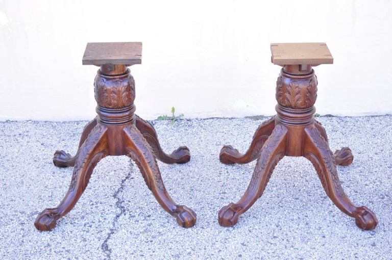 Chippendale style carved ball and claw dining table double pedestal base - legs only. Item features heavy solid wood construction, nicely carved details, carved ball and claw feet, quality craftsmanship, great style and form. Pedestals only. NO top.