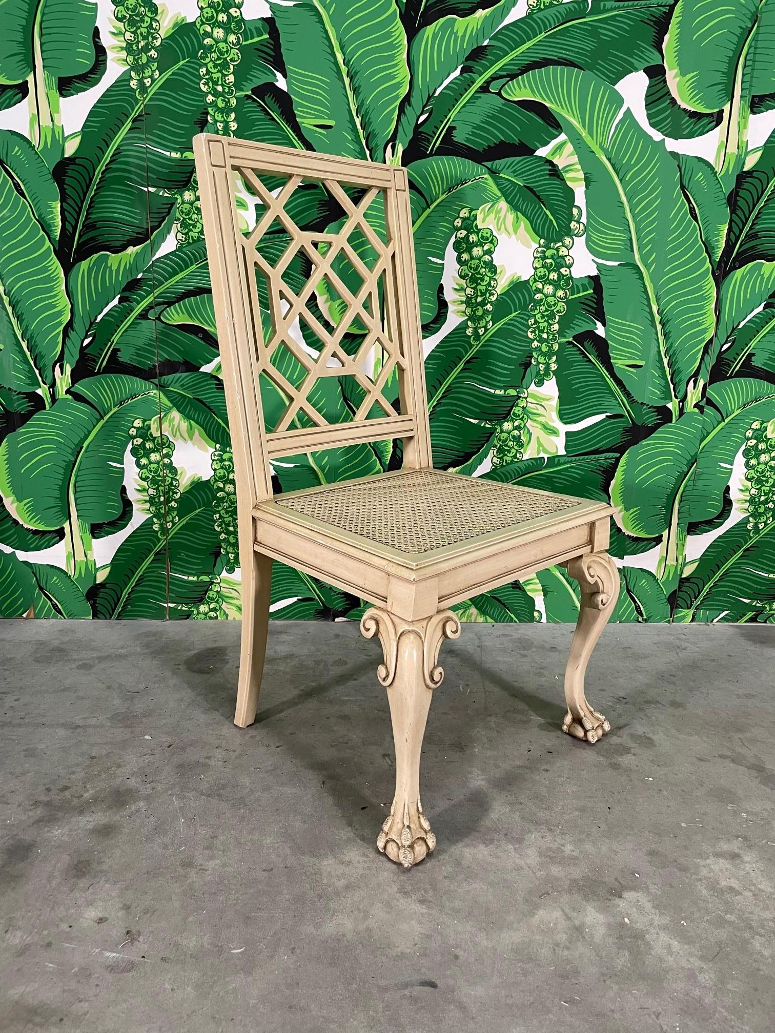 Set of eight cockpen style dining chairs feature cane seat insets and claw foot cabriolet front legs. Rear legs are slightly splayed. Set consists of two host chairs and six side chairs. The cockpen style chair derives it's name from Cockpen Parish