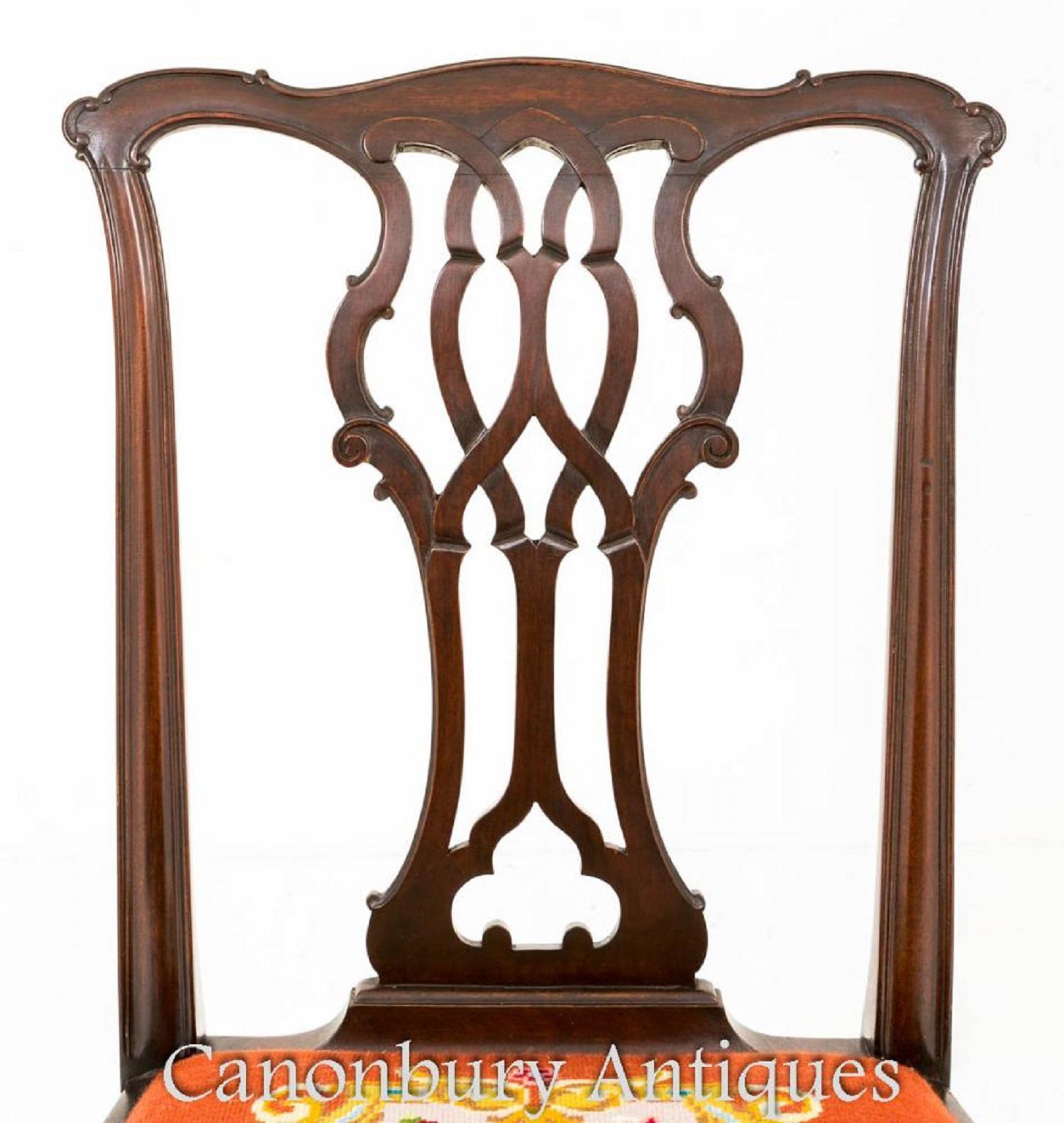 Good set of 8 (6+2) Mahogany Chippendale style dining chairs.
circa 1890
Each chair standing on swept legs with boldly carved ball and claw feet.
These chairs retain their original lift out needlework seats. The back splats being of a carved and