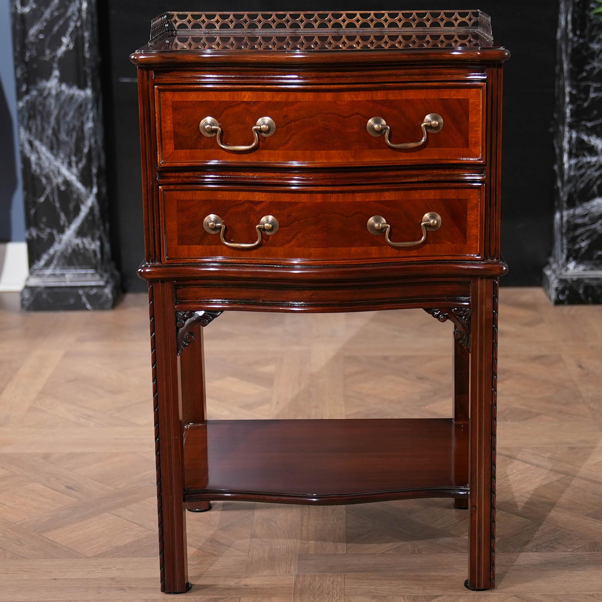 An attractive two drawer serpentine front Chippendale End Table suitable for use as either an end table or as a night stand. Great hand carved details and designer quality hardware give the Niagara Furniture Chippendale End Table a great look in any