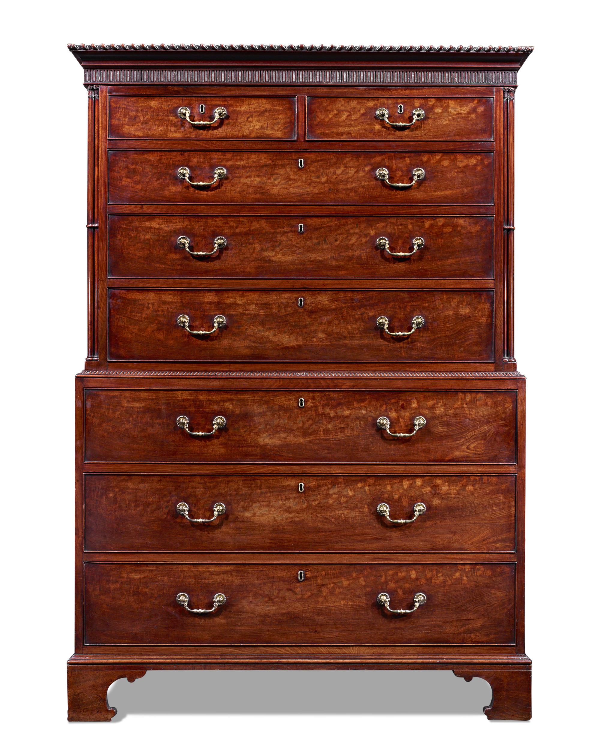 This monumental chest-on-chest exemplifies Thomas Chippendale’s signature style, highlighting the meticulous craftsmanship and neoclassical elements that have become synonymous with his name. An undeniable triumph, this cabinet attributed to the