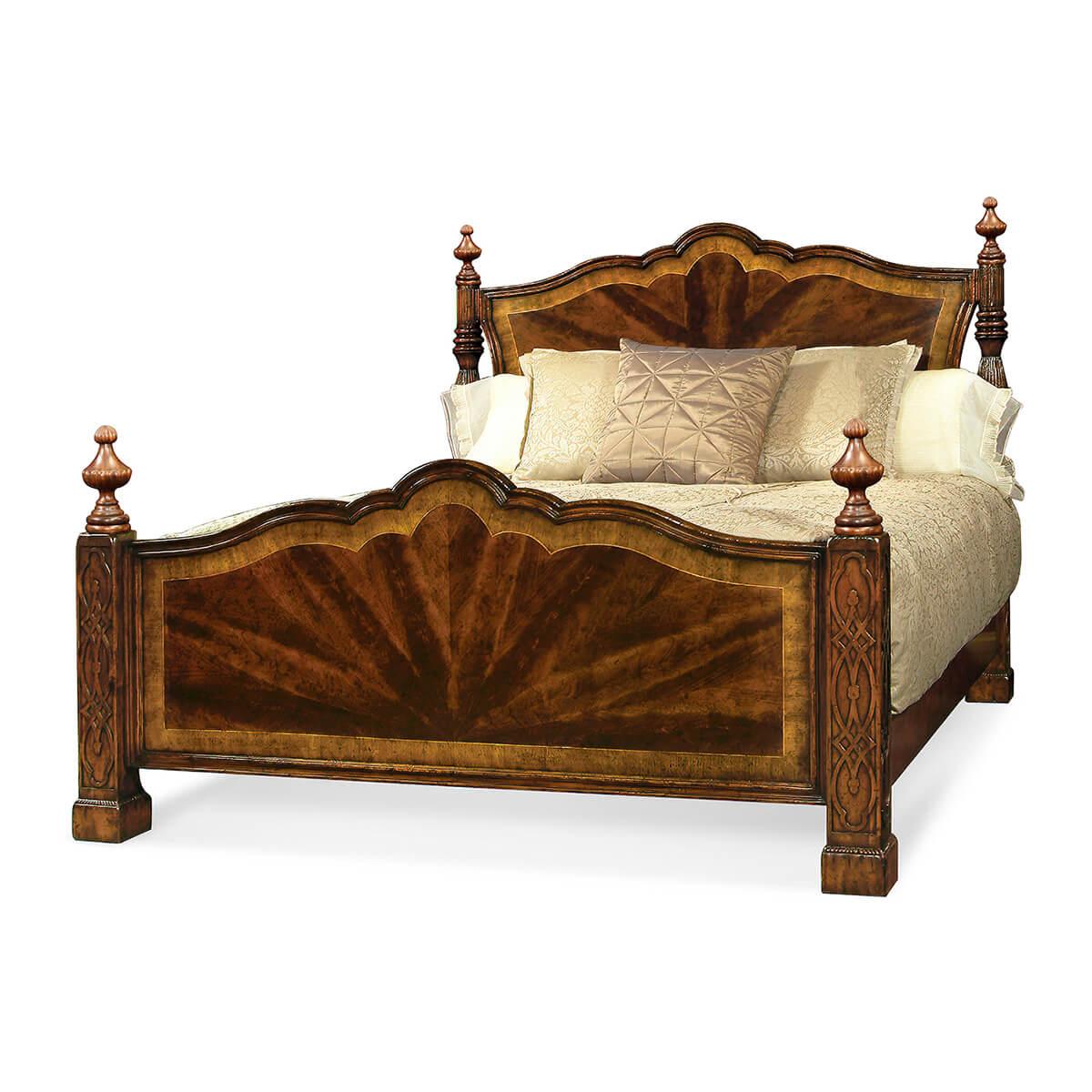 Chippendale style four-post bed US King, finest mahogany flame veneers and satinwood crossbanding on the head and footboard, high turned and reeded posts on square carved fretwork legs.

Dimensions: 82.75