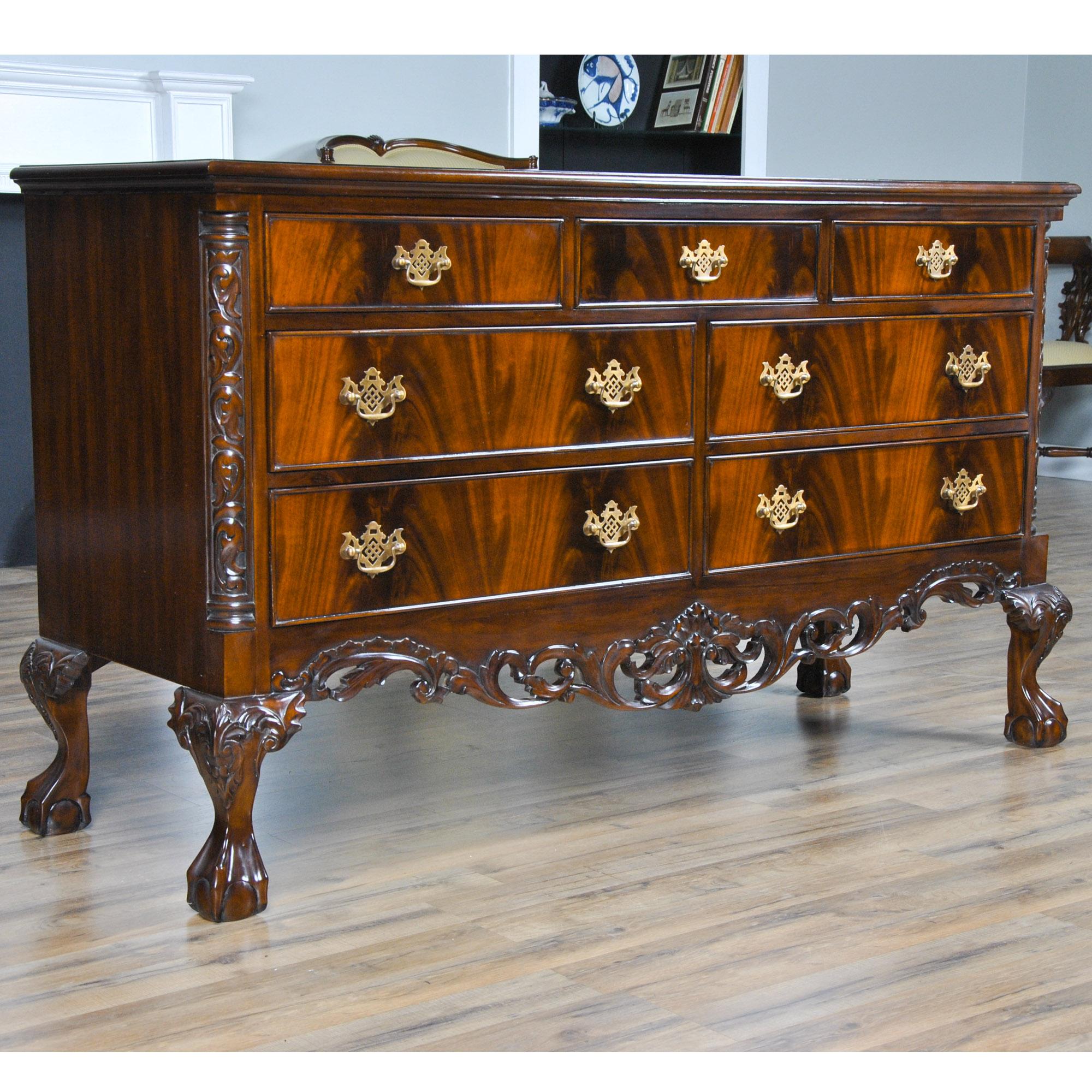 The Chippendale Mahogany Triple Dresser. A classic furniture shape this chest features three drawers across the top section and two rows of two drawers below to give this large dresser an elegant and traditional furniture appearance that is both