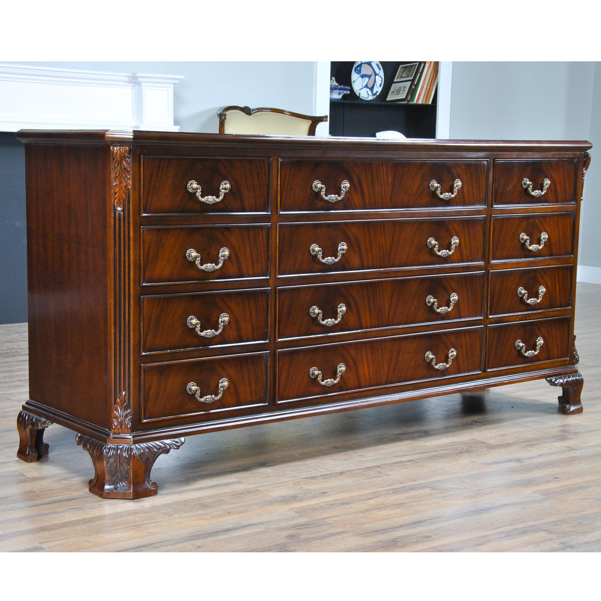 The Chippendale Mahogany Triple Dresser is a classic furniture shape. This chest features three drawers across the top section and then three more rows of three drawers below to give our largest dresser an elegant and traditional furniture