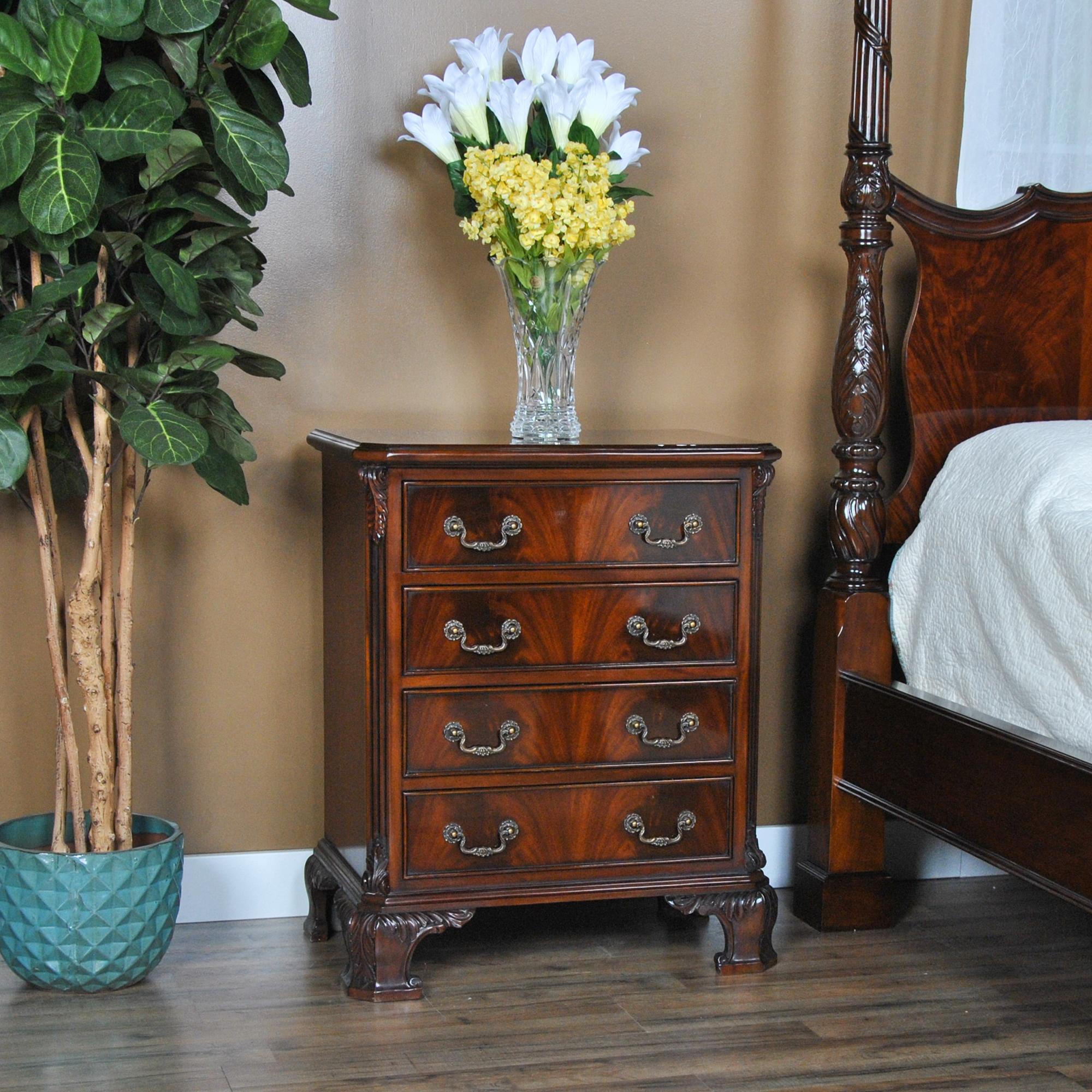 A fine quality Chippendale Night Stand featuring hand carved, solid mahogany details as well as dovetailed drawers. Fine quality drawer fronts create a beautiful pattern, accented by antique style hardware. Taller than most of our night stands this