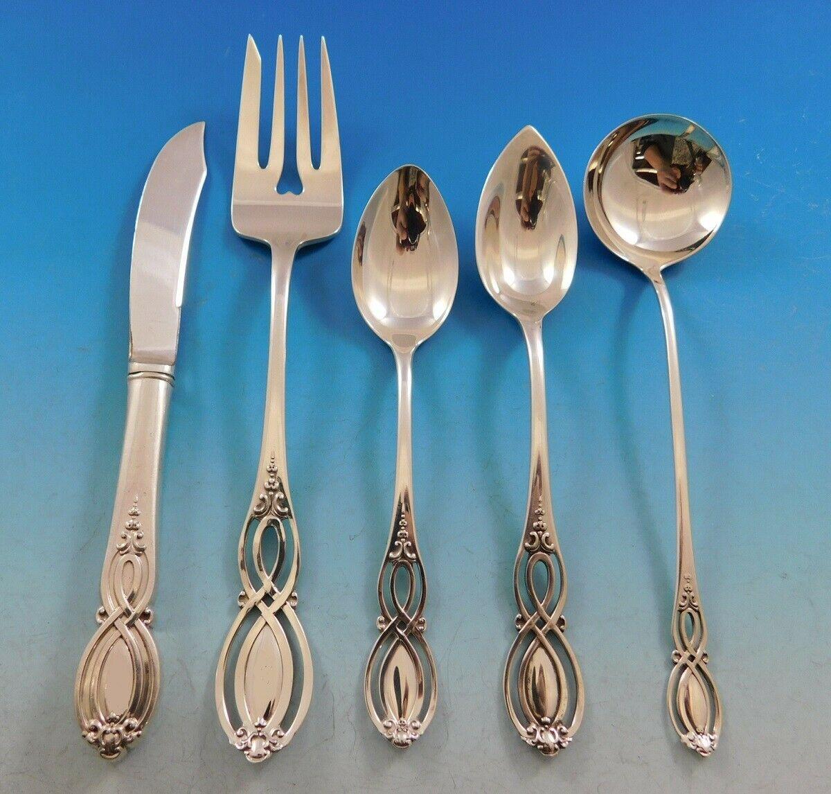Monumental rare Chippendale old by Alvin, circa 1900, sterling silver flatware set, 206 pieces. This pattern features a unique pierced handle and fabulous serving pieces. This set includes:

10 dinner size knives, french blades, 9 3/4
