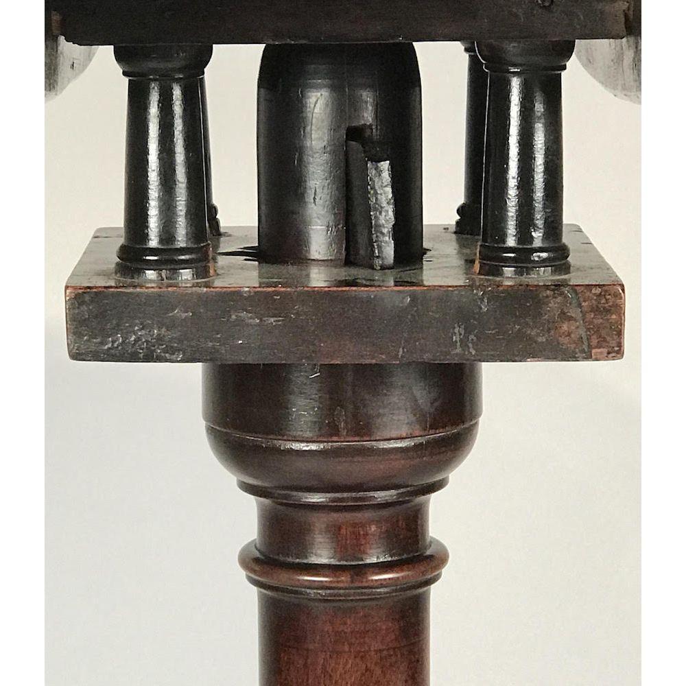 An English carved pie crust tripod table in mahogany. 
George III, Chippendale period. Mid 18th century, circa 1760.

This fine antique table has a one piece, well-figured and patinated top, and is of excellent color.
The top is raised on a 'bird