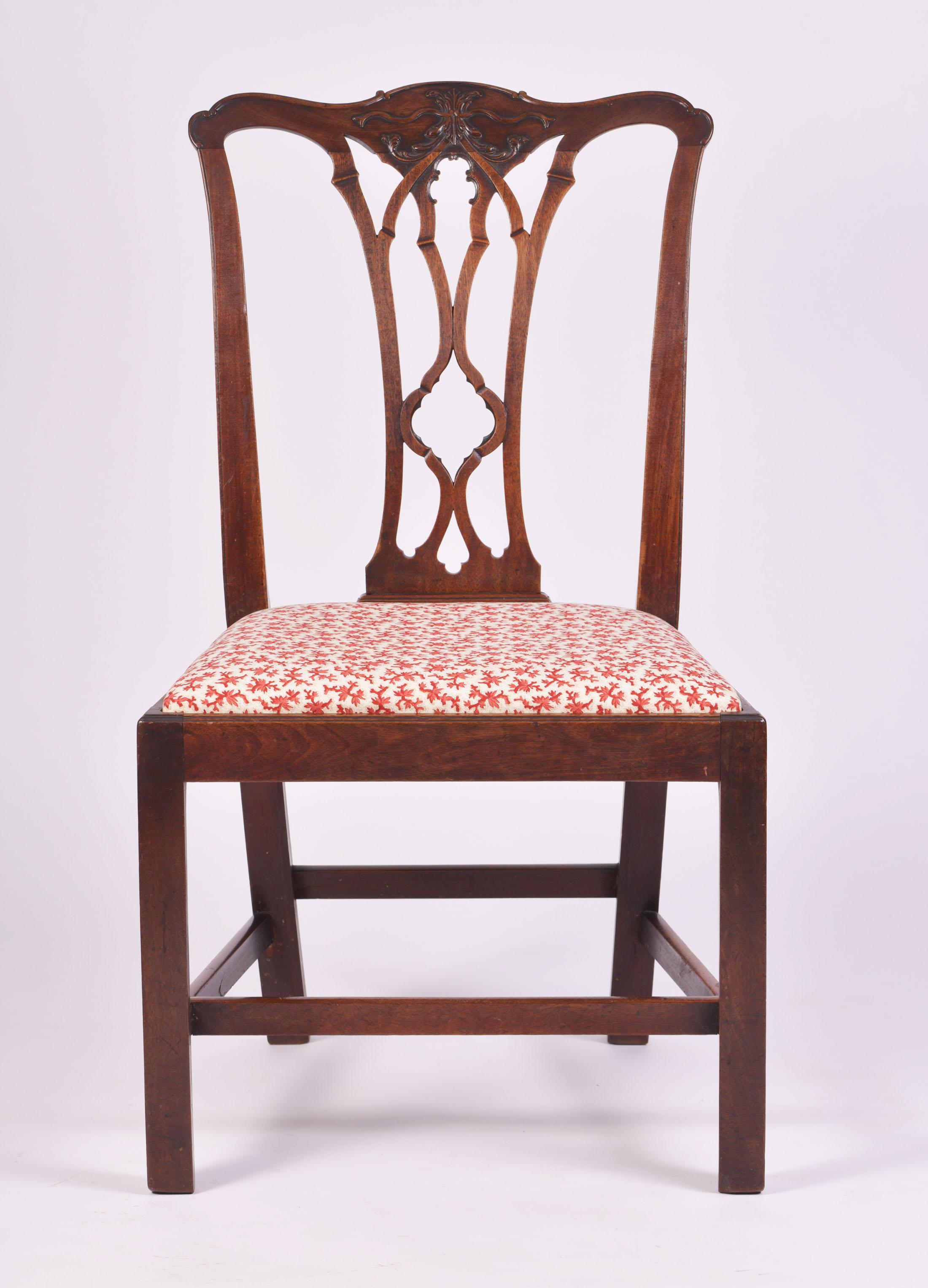 This lovely Chippendale period carved mahogany side chair features an upholstered red patterned seat and a nicely fretted back splat. The chair measures 20 ½ in – 52 cm deep, 22 in – 56 cm wide and 38 in – 96.5 cm in height. This attractive and