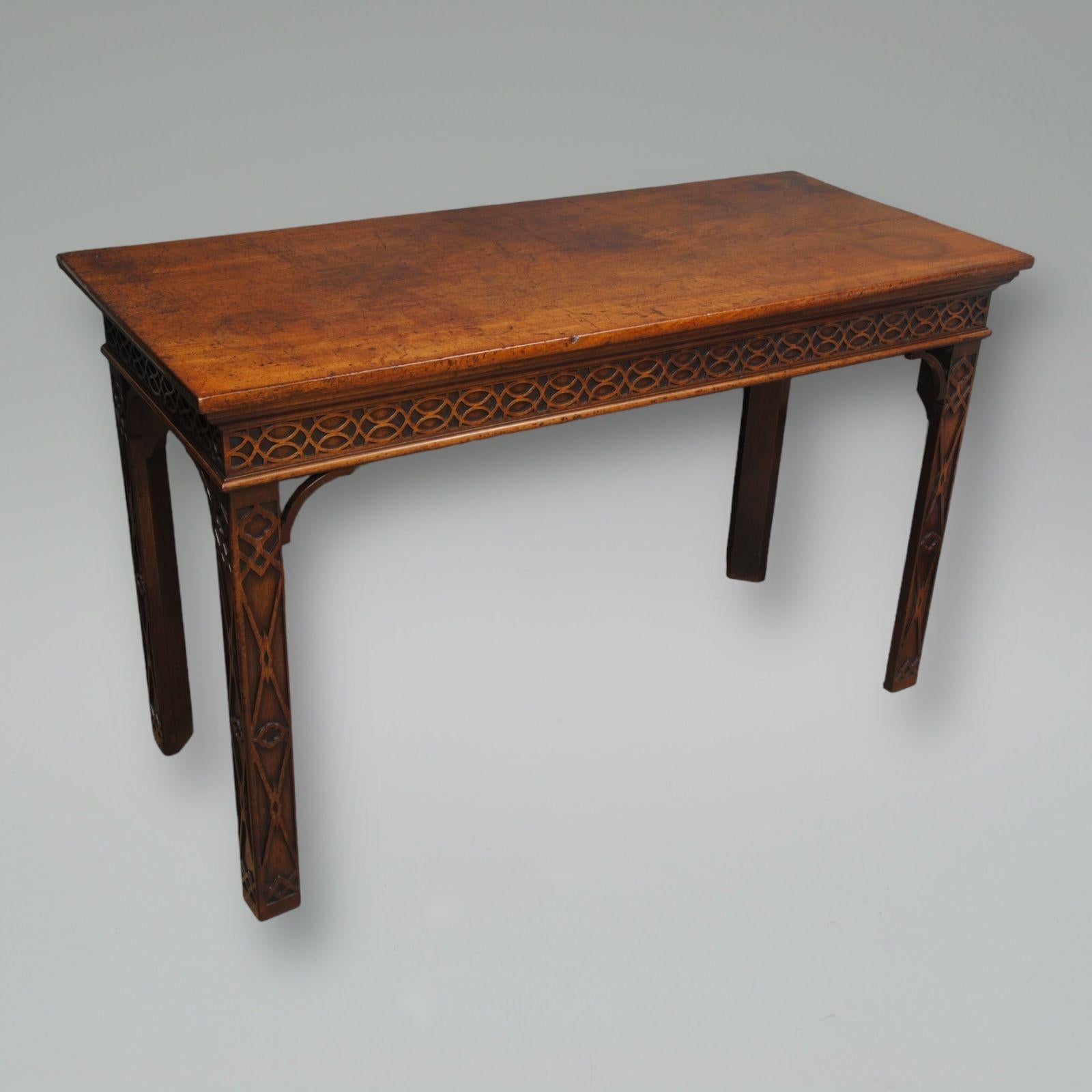 An 18th century mahogany serving table with blind fret decoration on the legs and frieze.
Circa 1770