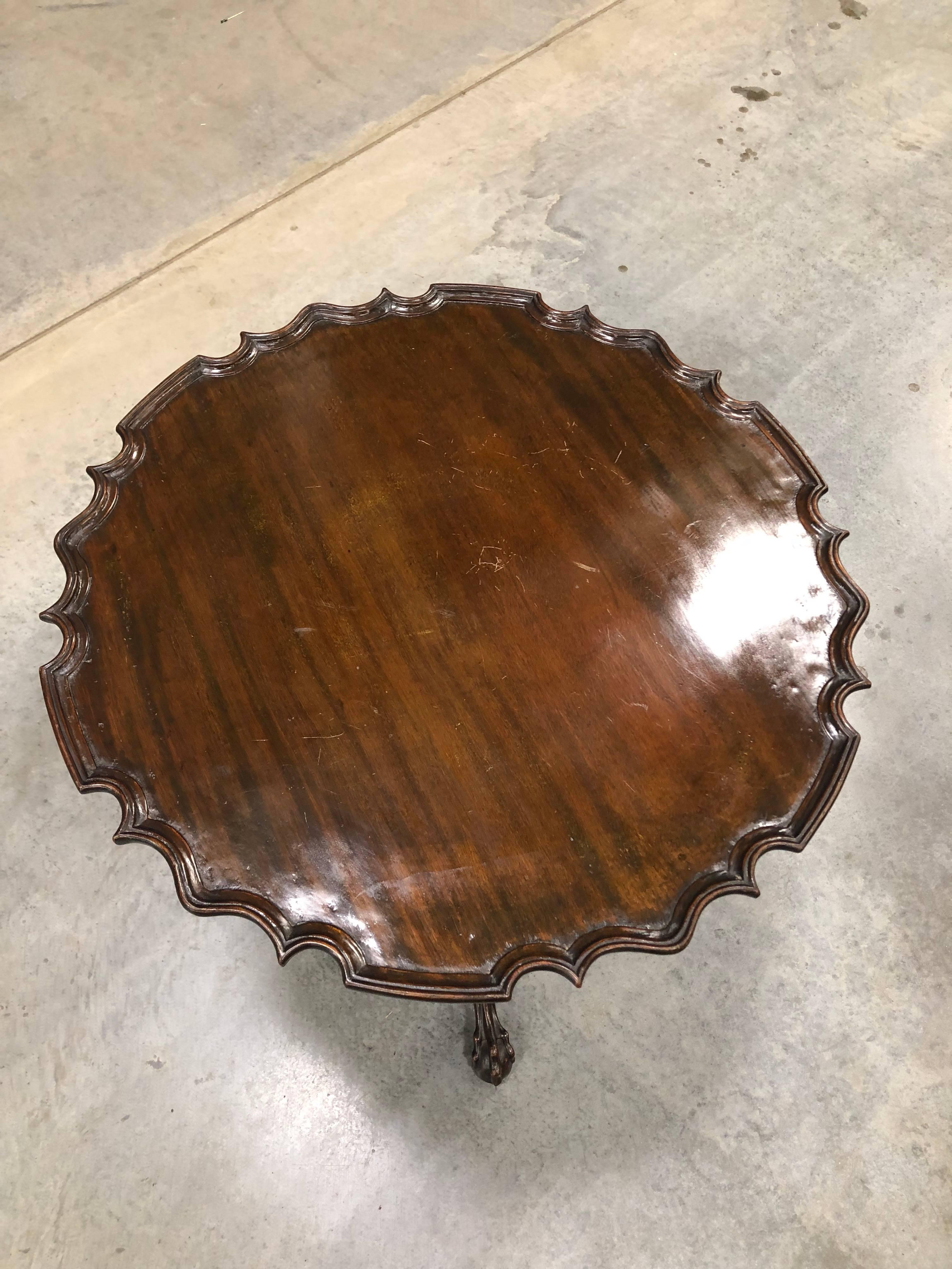 Chippendale pie crust tilt-top table with carved urn and fluted shaft ball claw feet
Nice historic surface and color diminutive size, circa 1770.