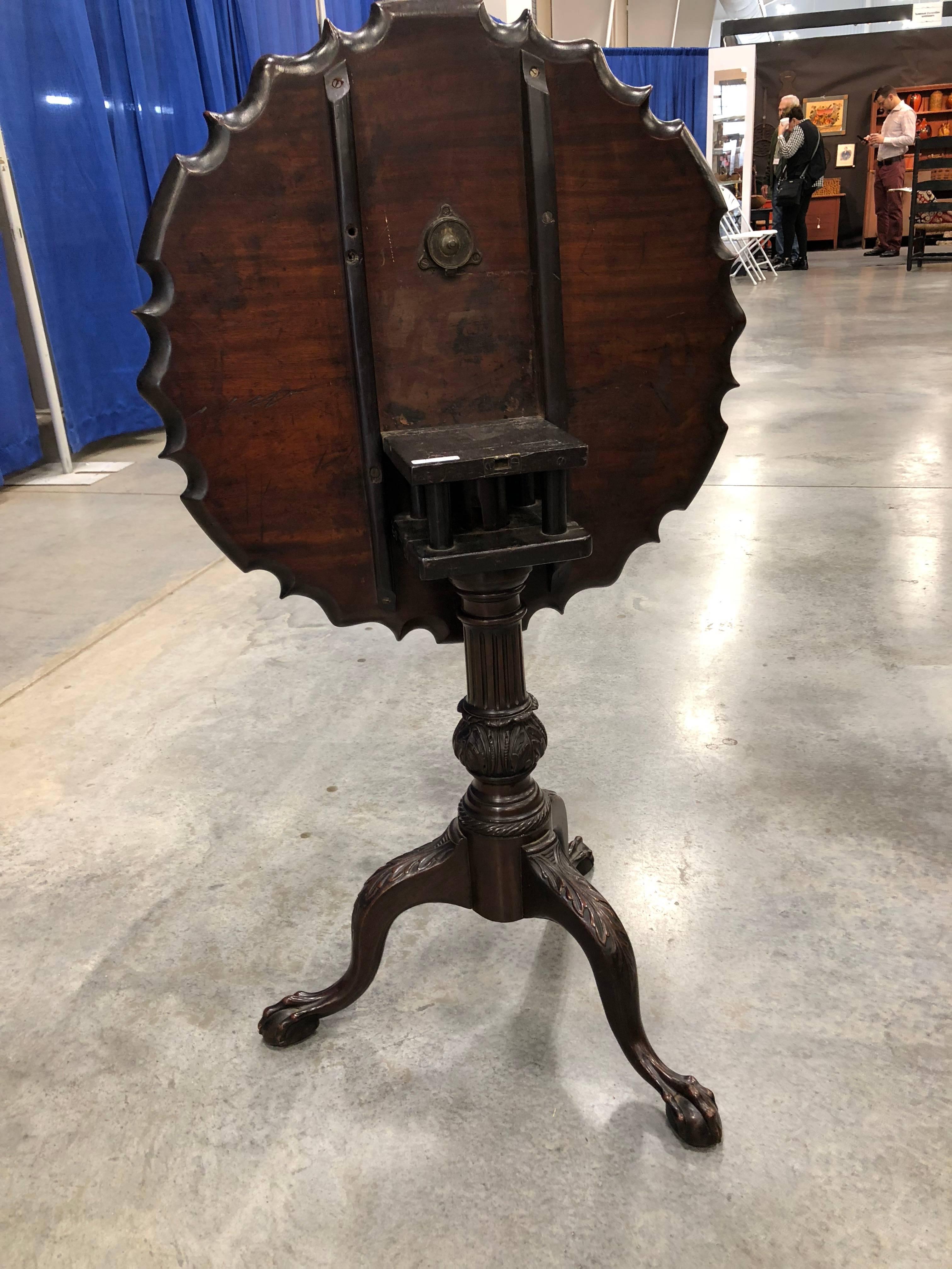 Hand-Carved Chippendale Pie Crust Tilt-Top Table with Carved Urn and Fluted Shaft For Sale