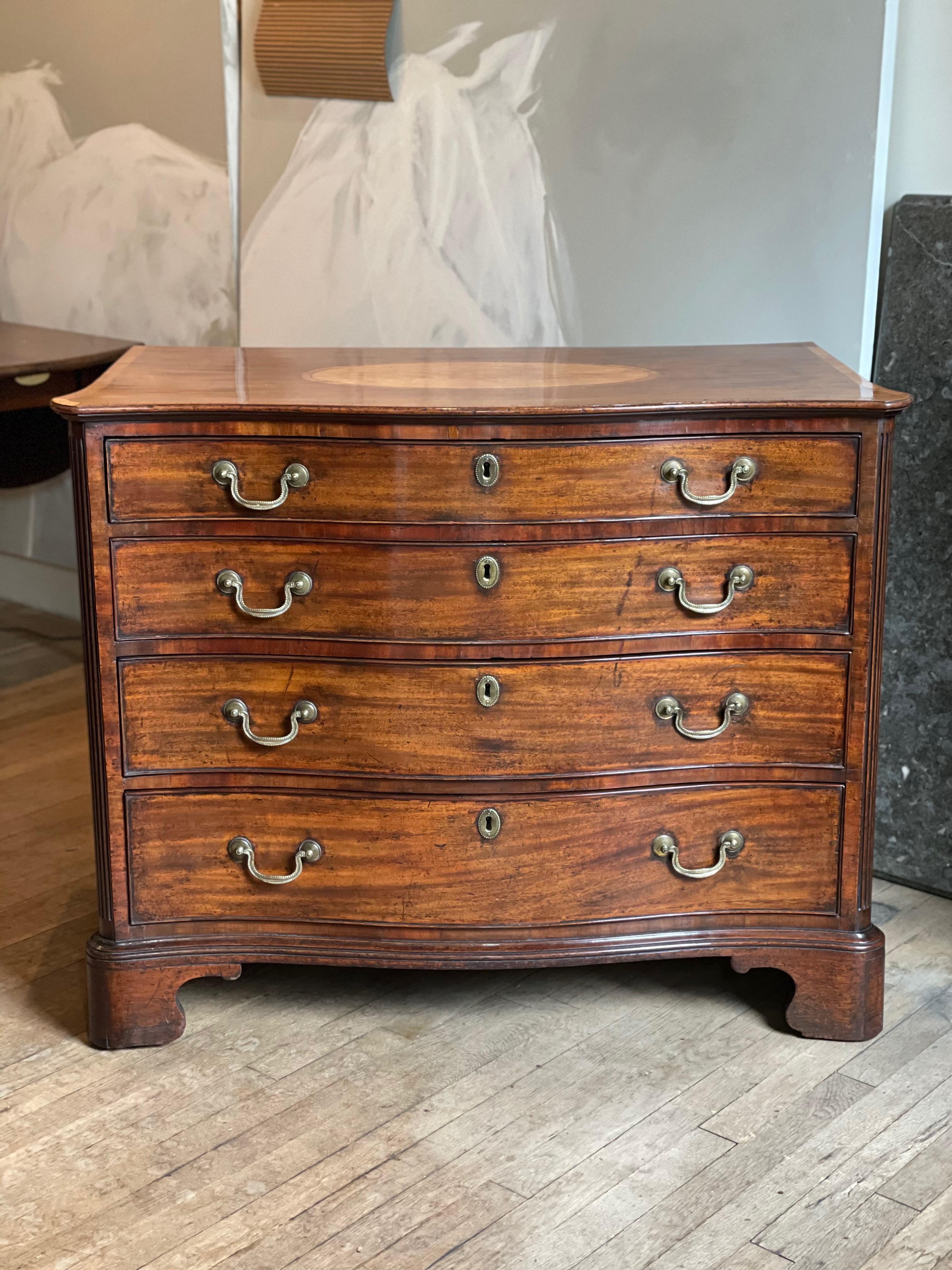Chippendale satinwood & tulipwood inlaid mahogany serpentine chest of drawers
English, circa 1770
Measures: 33 x 41 x 21 ½ inches

[2257].