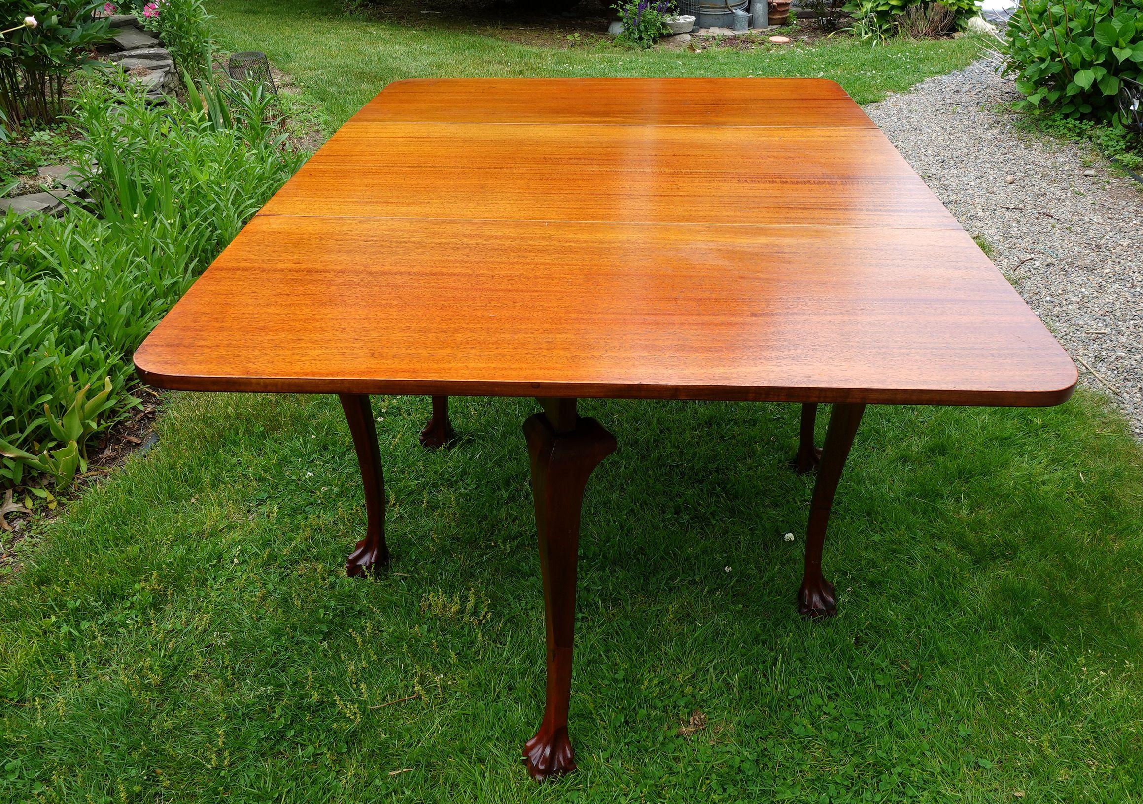 Wood Chippendale Six Leg Claw and Ball Drop-Leaf Dining Table For Sale