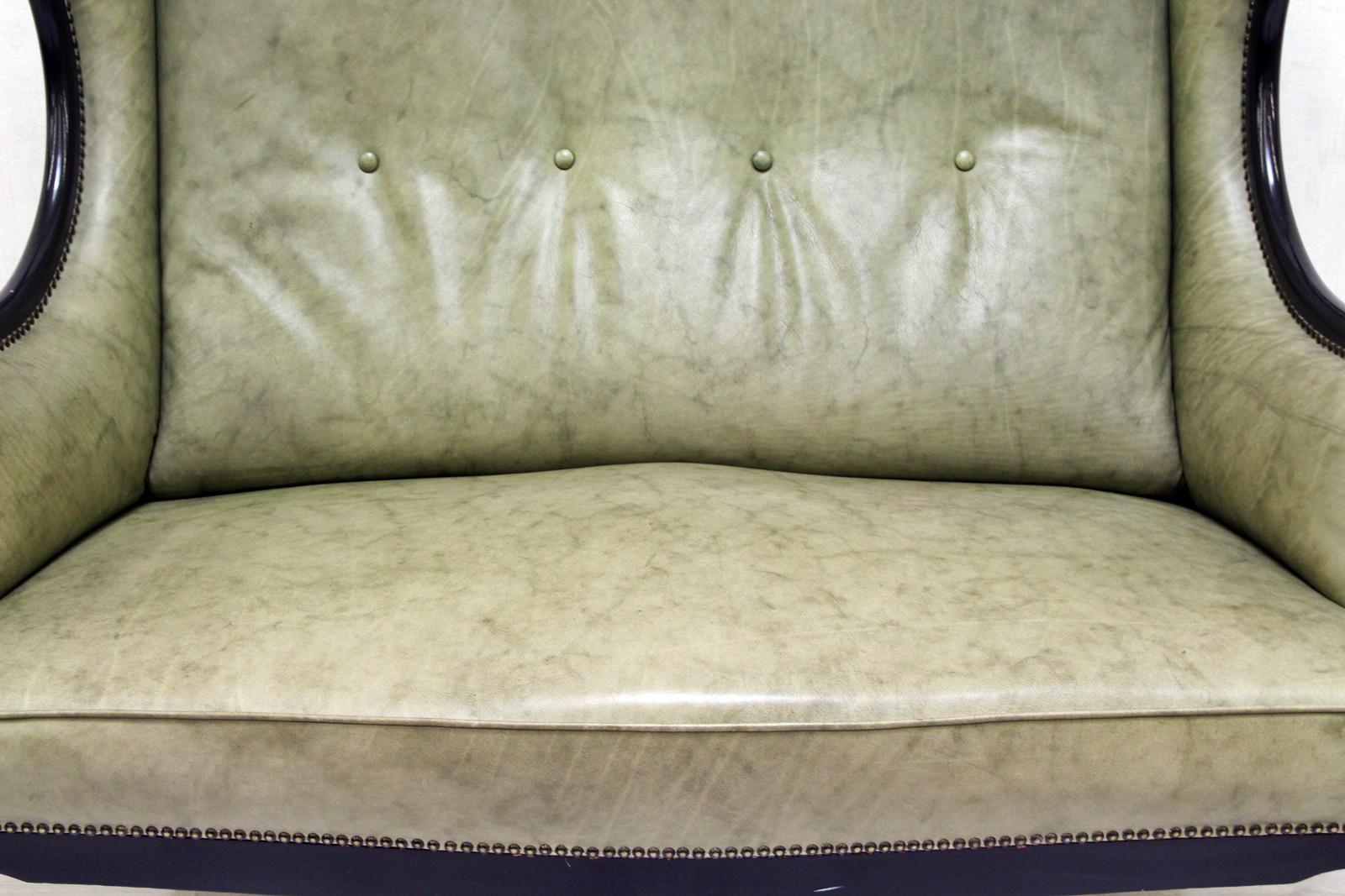 Chippendale real leather 2-seat sofa
in original design and newly covered with genuine leather.

Condition: The chair is in a very good condition
armchair.
Measures: Height x 112cm, length x 86cm, depth x 85cm.
Upholstery is in a very good