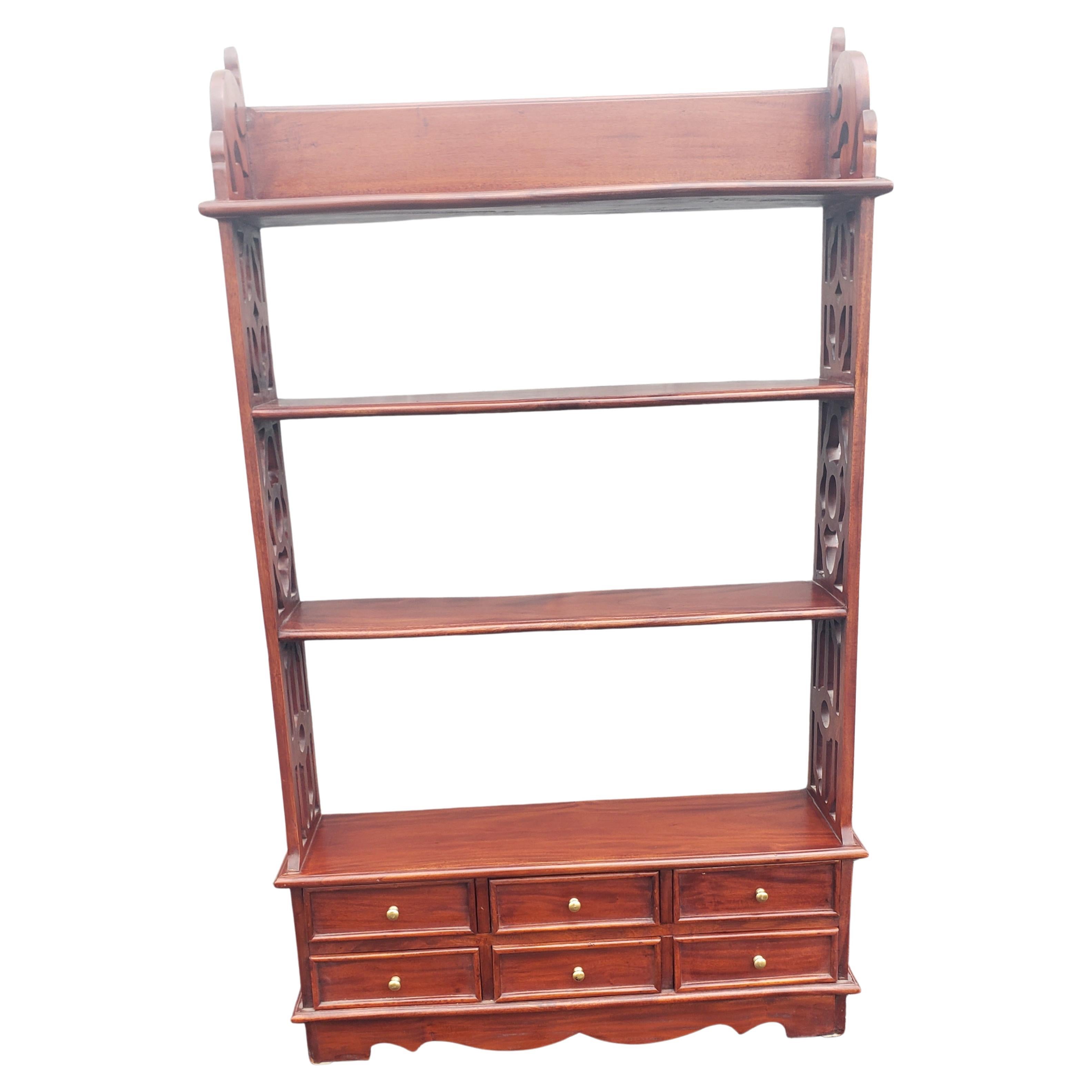 Late 20th century Chippendale Solid Cherry 6-drawer 4-tier free standing or wall hanging shelves. 
Excellent vintage condition. Measures 25.75