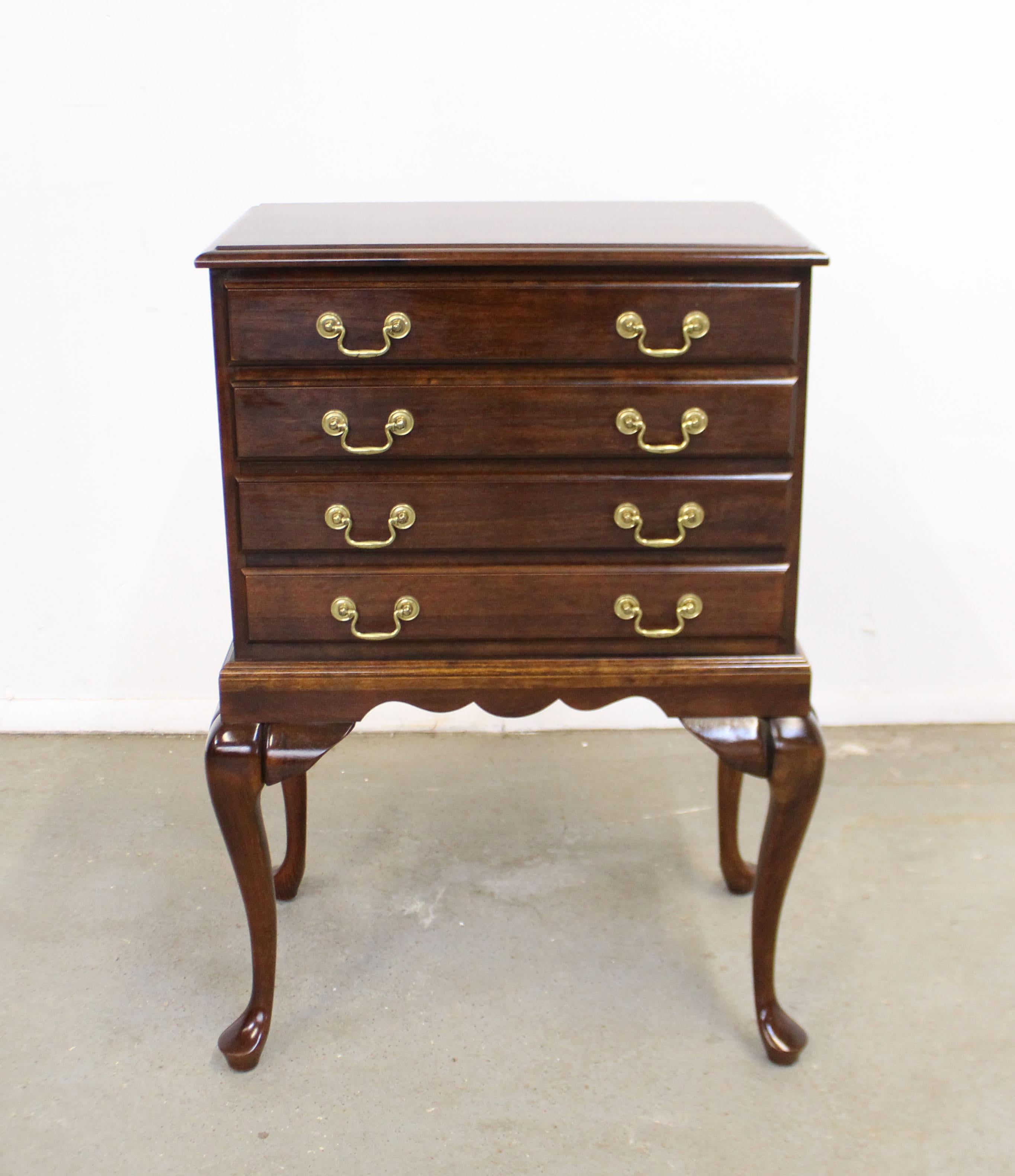 Offered is a Chippendale cherry silver chest attributed to Statton 'Old Town'. Features dovetailed drawers with gold tone pulls and a solid cherry back. It has 4 drawers that include inner dividers for silverware. It is in good condition, shows